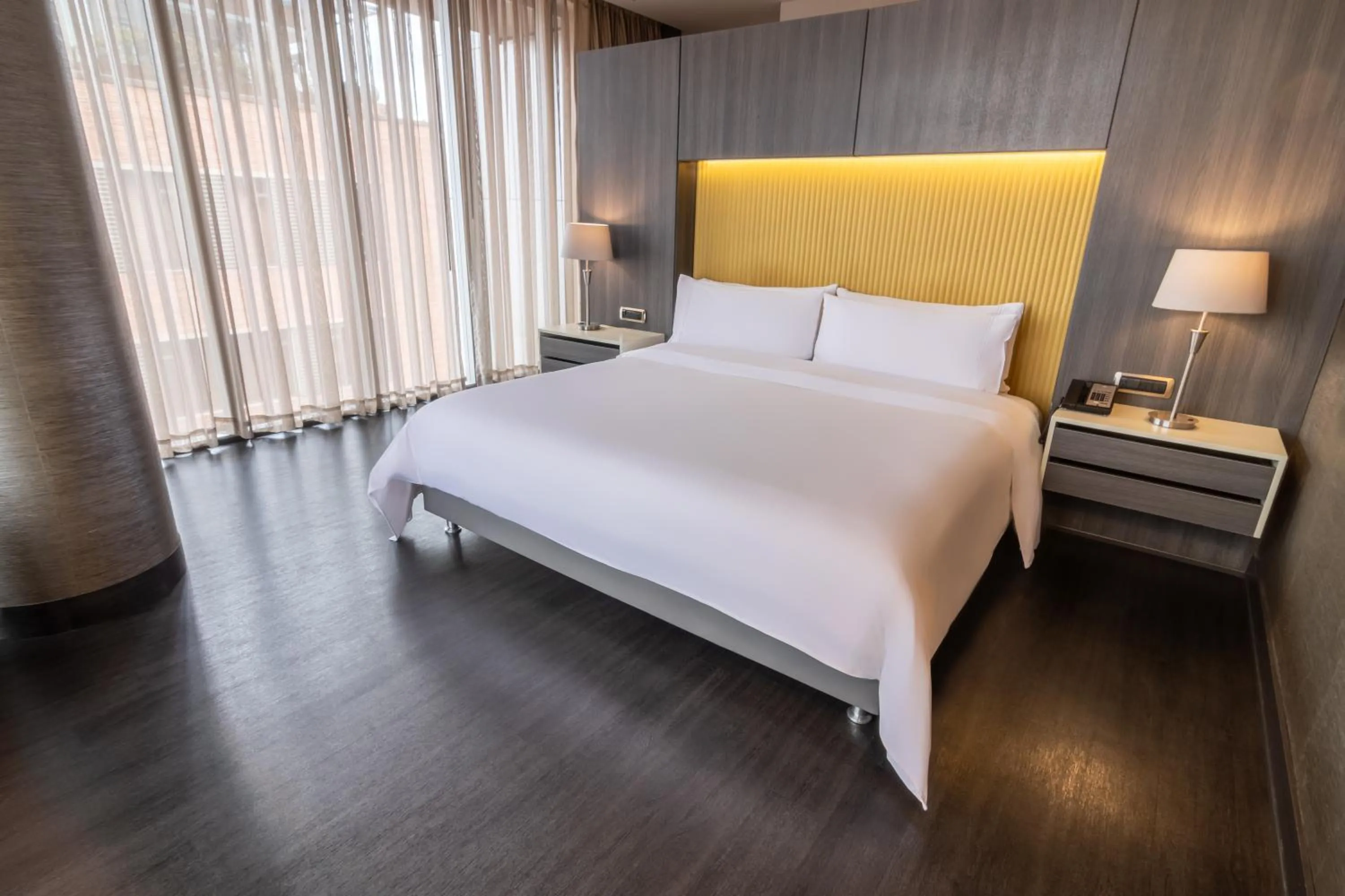 Bed in GHL Bioxury Hotel