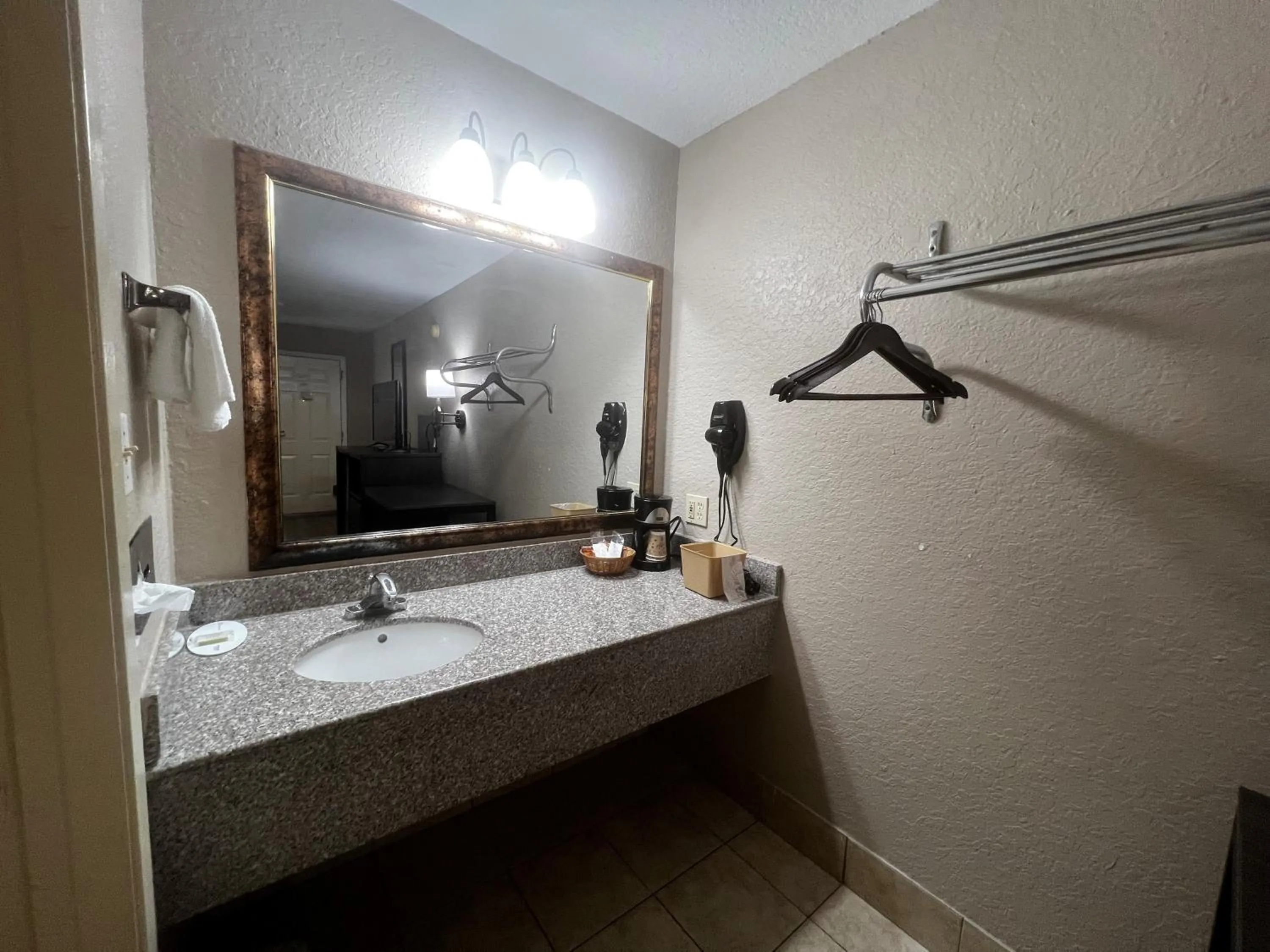 Bathroom in Super 8 by Wyndham La Marque TX/Texas City Area