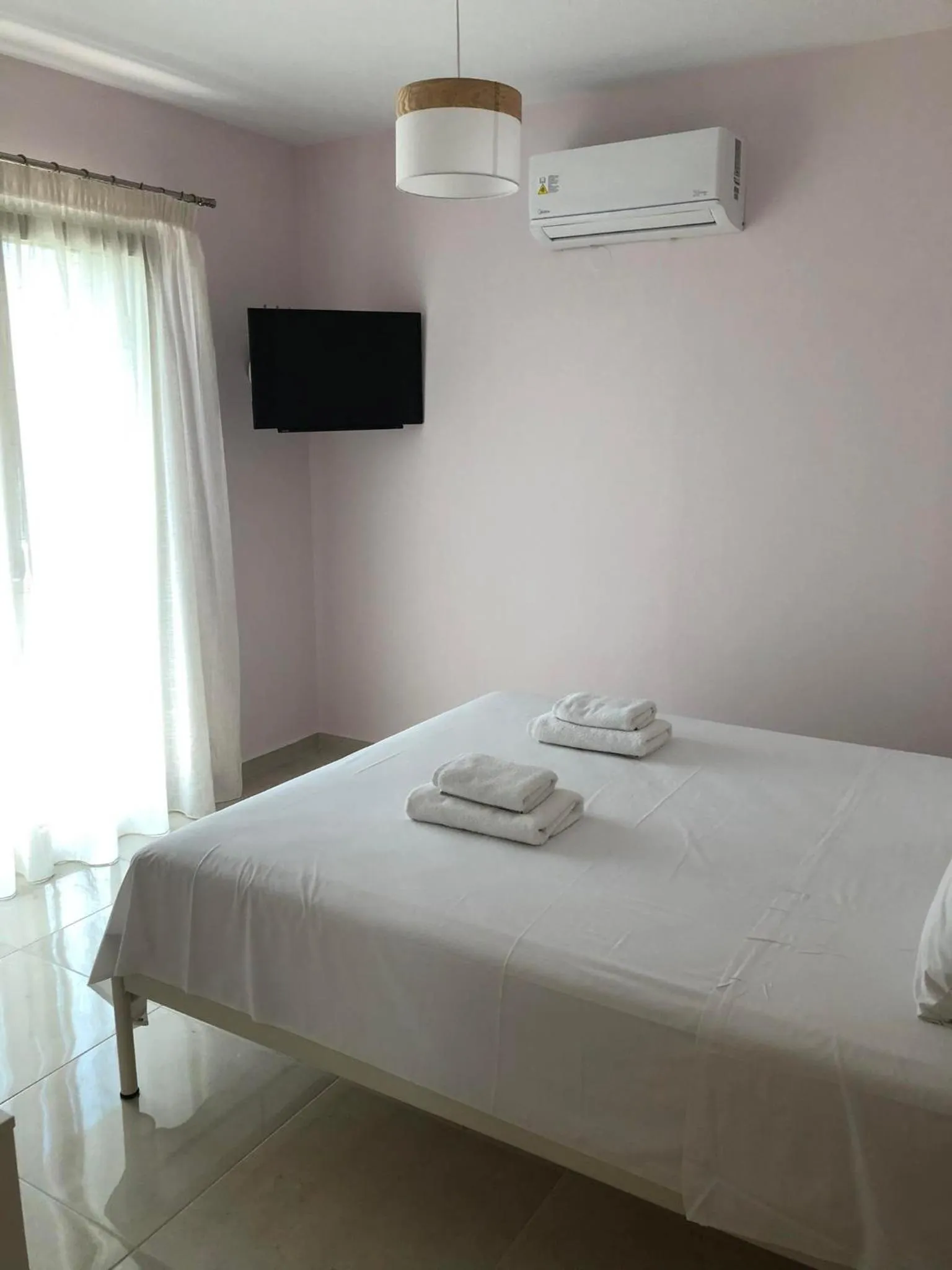 Bed in Bounatsa Studios & Apartments