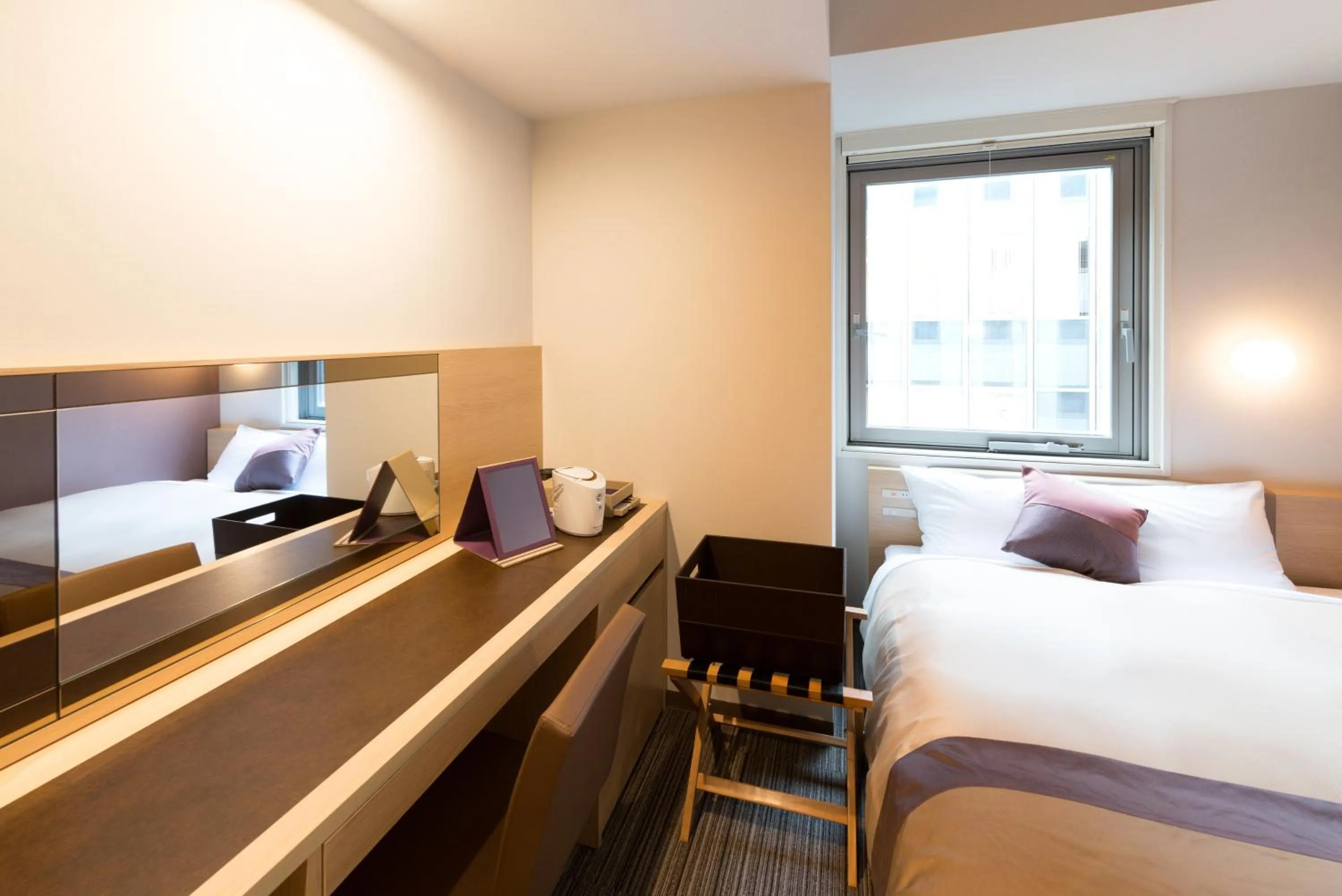 Bed in Super Hotel Premier Tokyo Station Yaesu-Chuoguchi