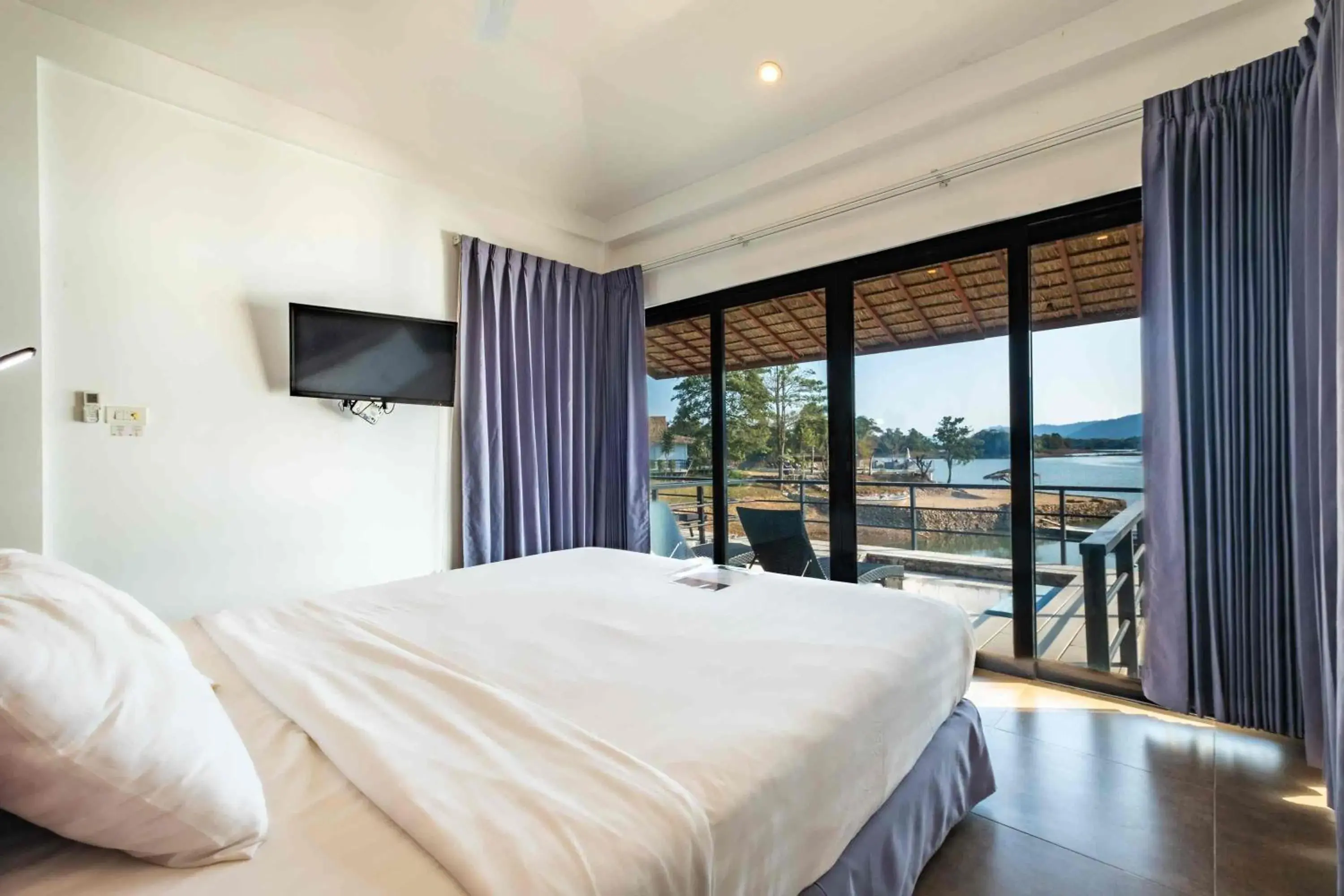 Deluxe Bungalow in The Sanctuary Nam Ngum Beach Resort Deluxe Bungalow in The Sanctuary Nam Ngum Beach Resort