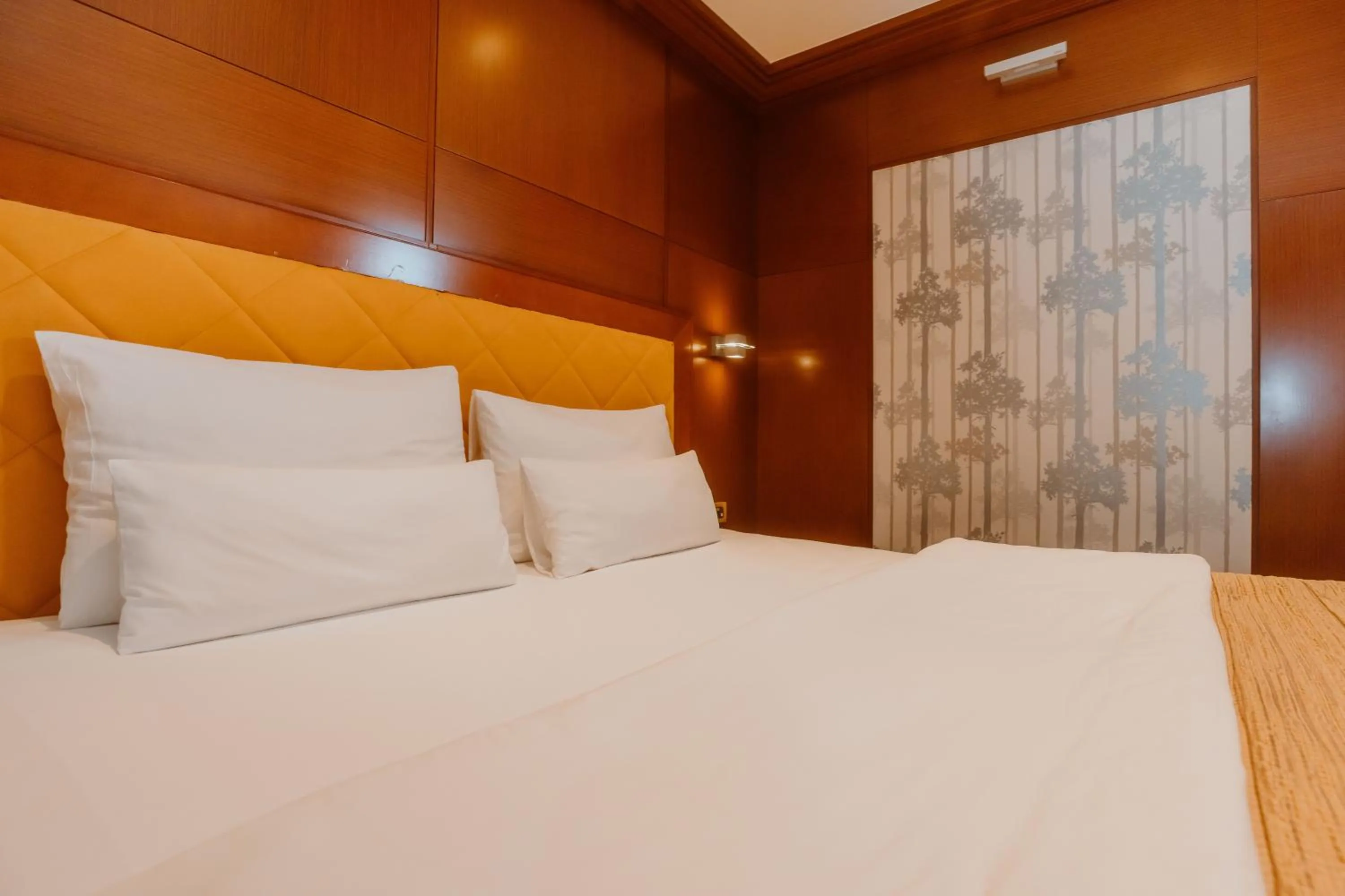 Bed in Garni Hotel Aleksandar