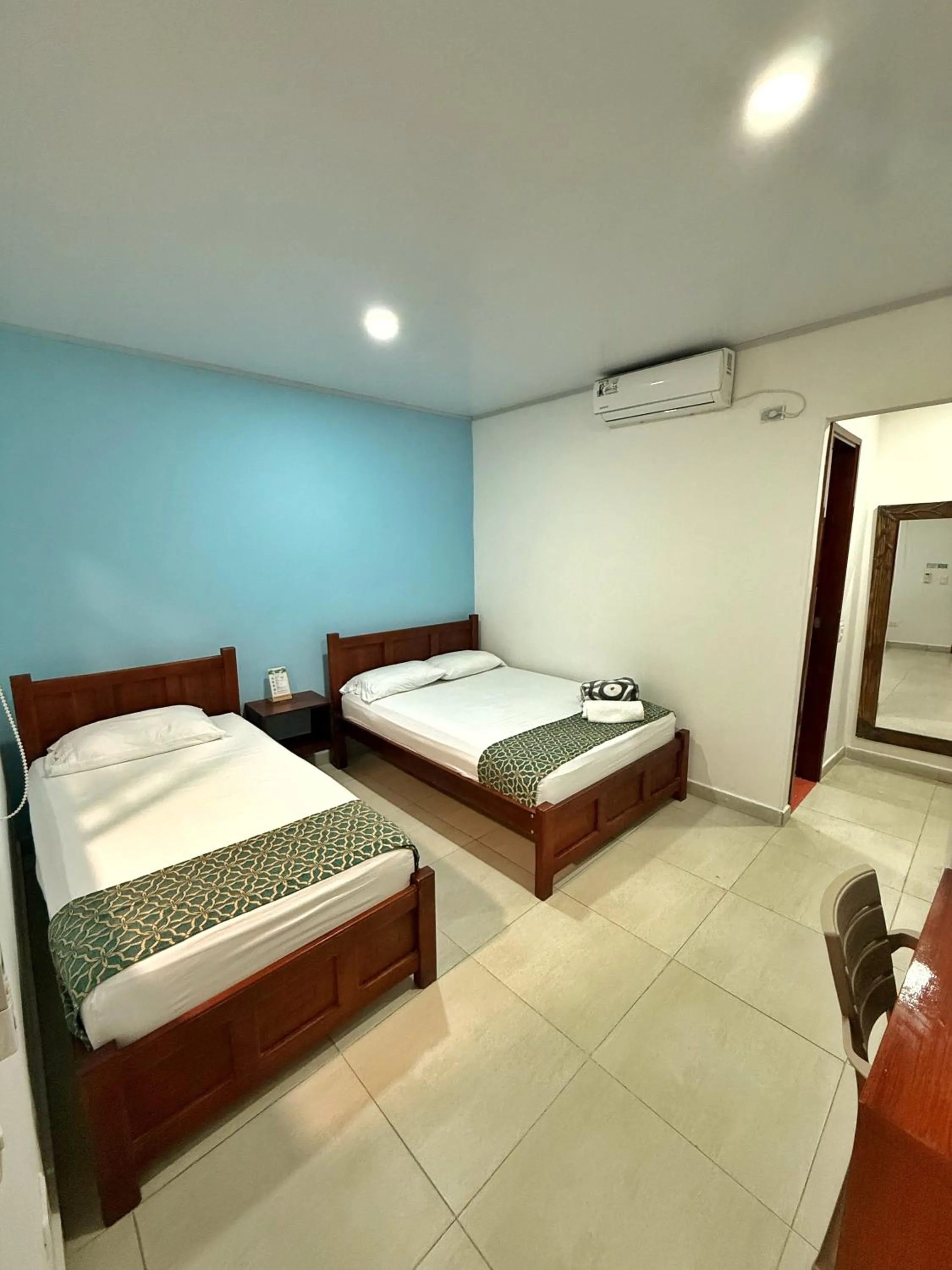 Photo of the whole room, Bed in Apartahotel Caribe Diez
