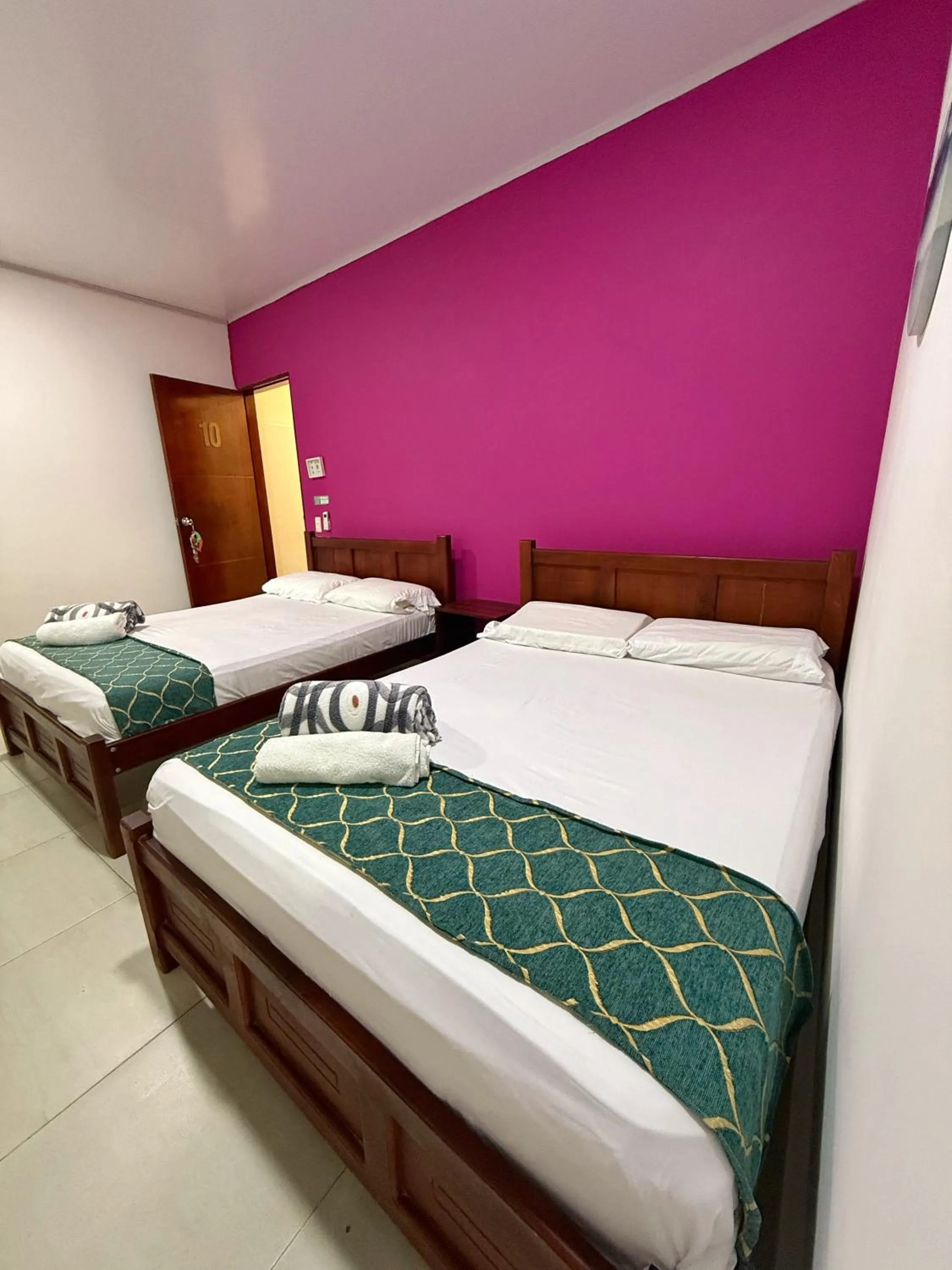 Bed in Apartahotel Caribe Diez