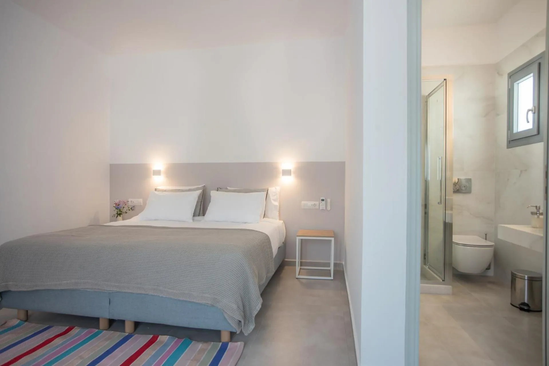 Bed in Nautilus Apartments-Suites