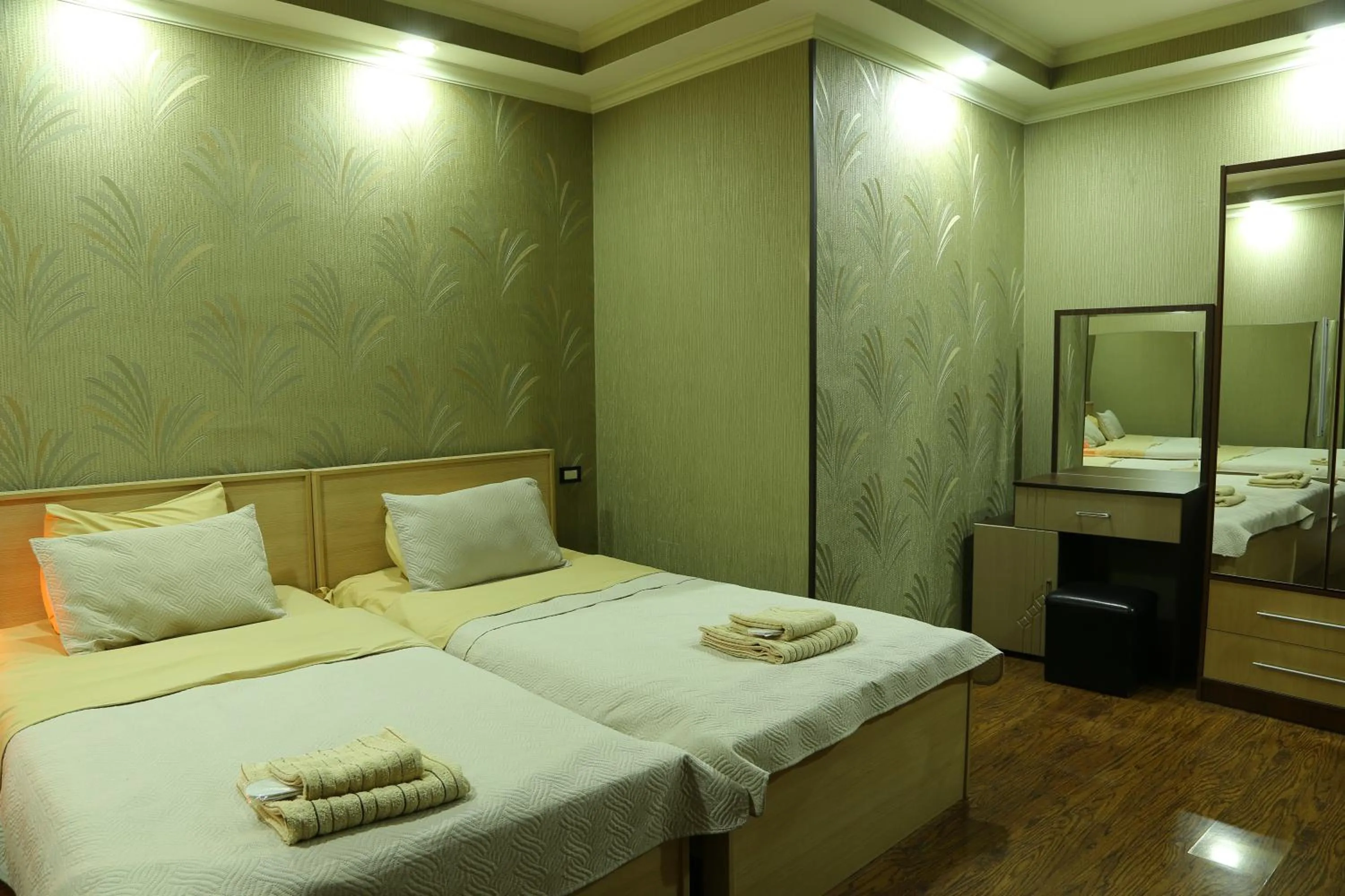 Bed in Dkd-bridge Hotel