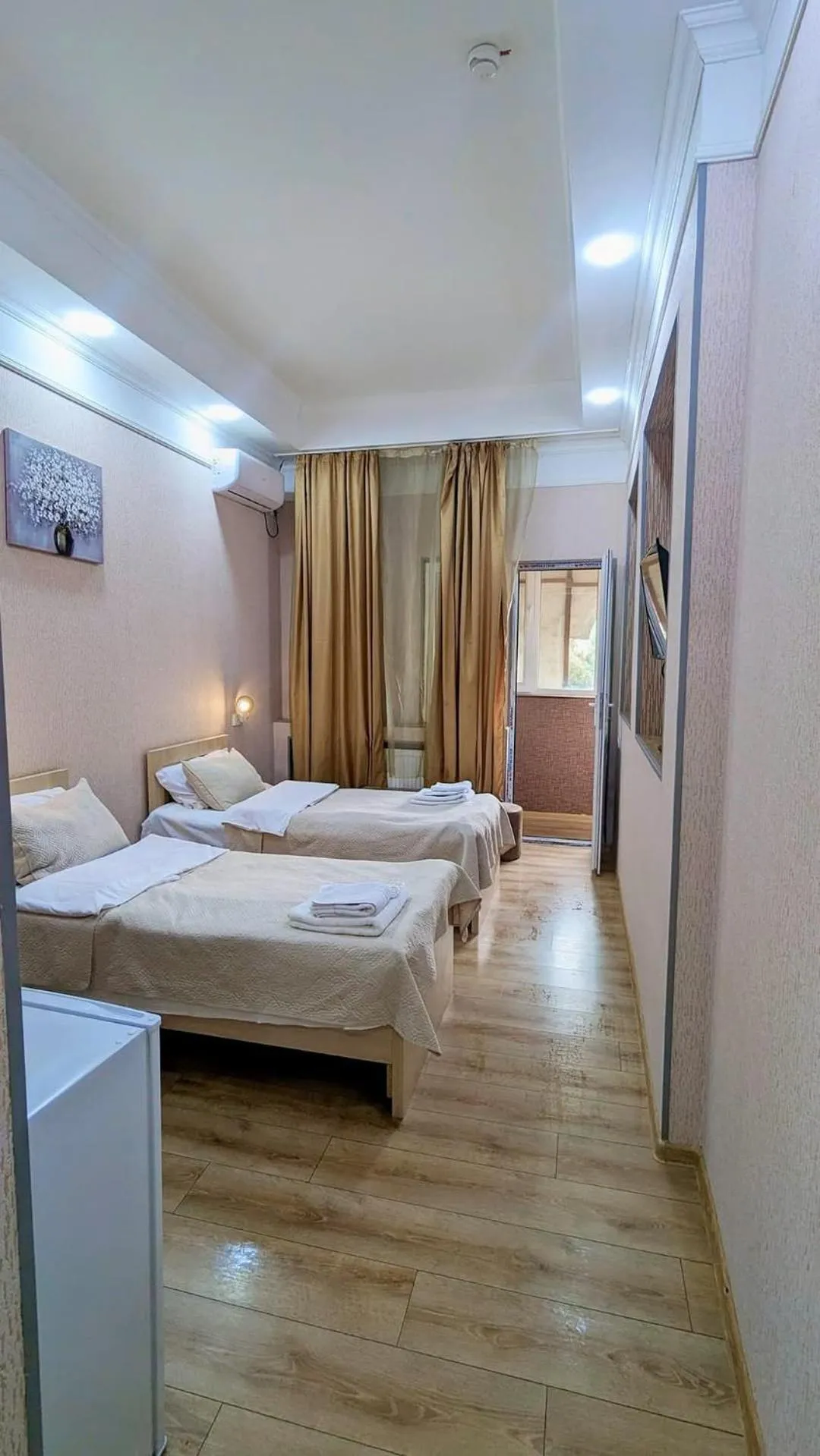 Bed in Dkd-bridge Hotel