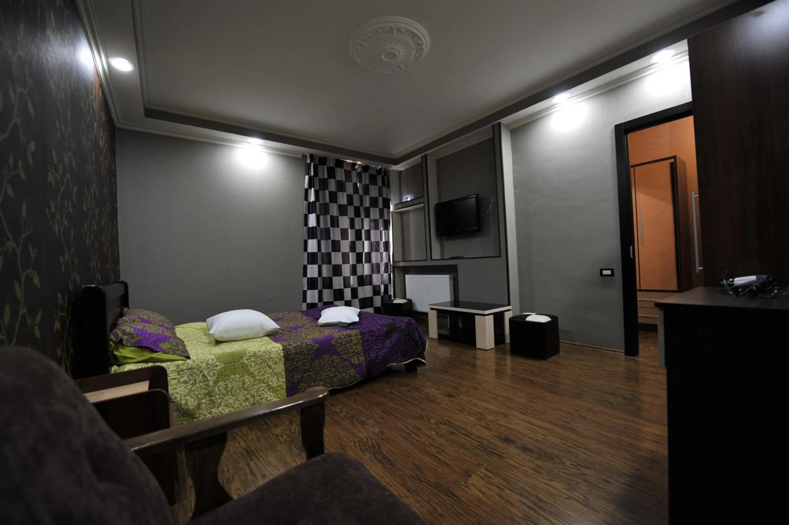 Bedroom in Dkd-bridge Hotel