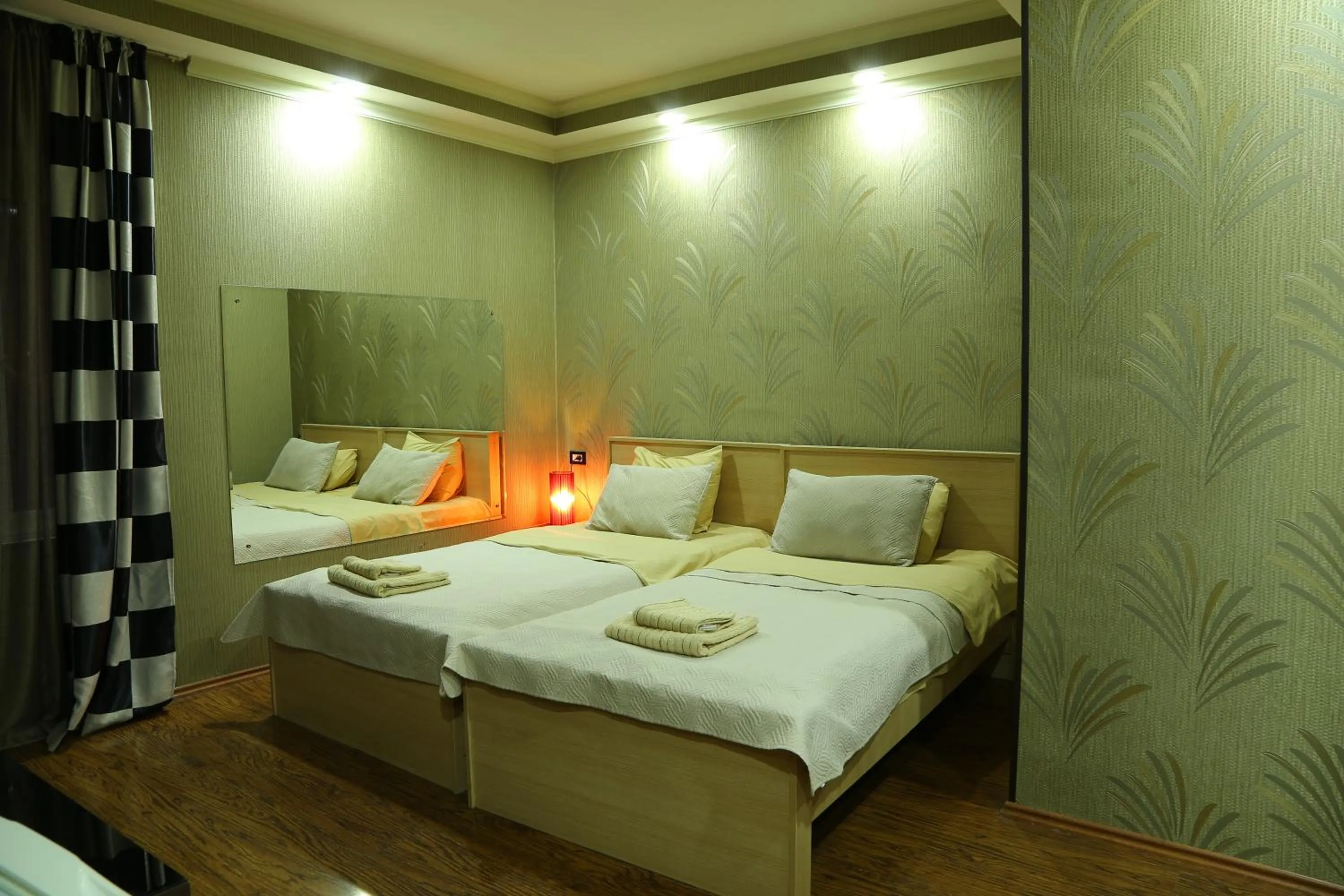 Bed in Dkd-bridge Hotel