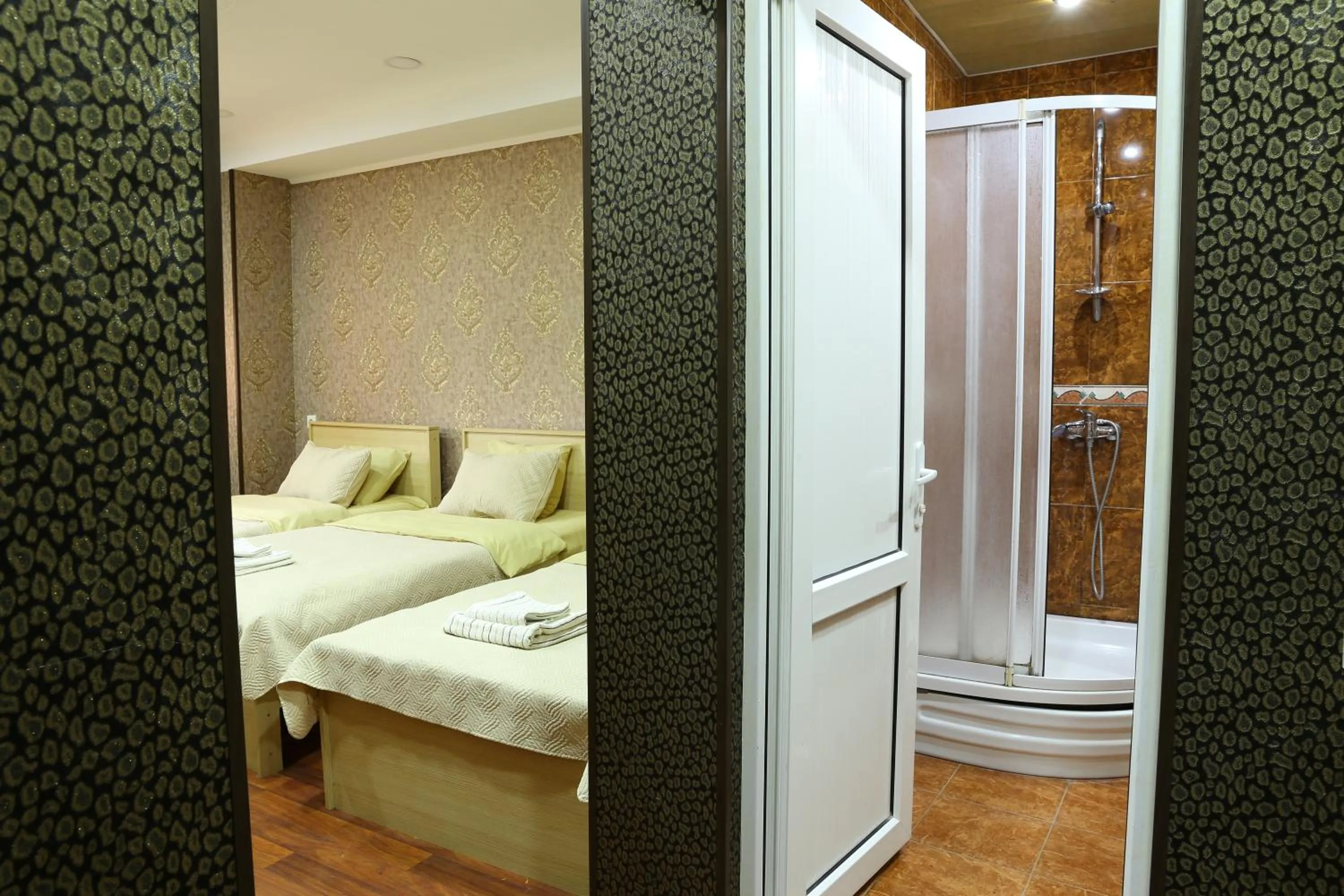 Bed in Dkd-bridge Hotel