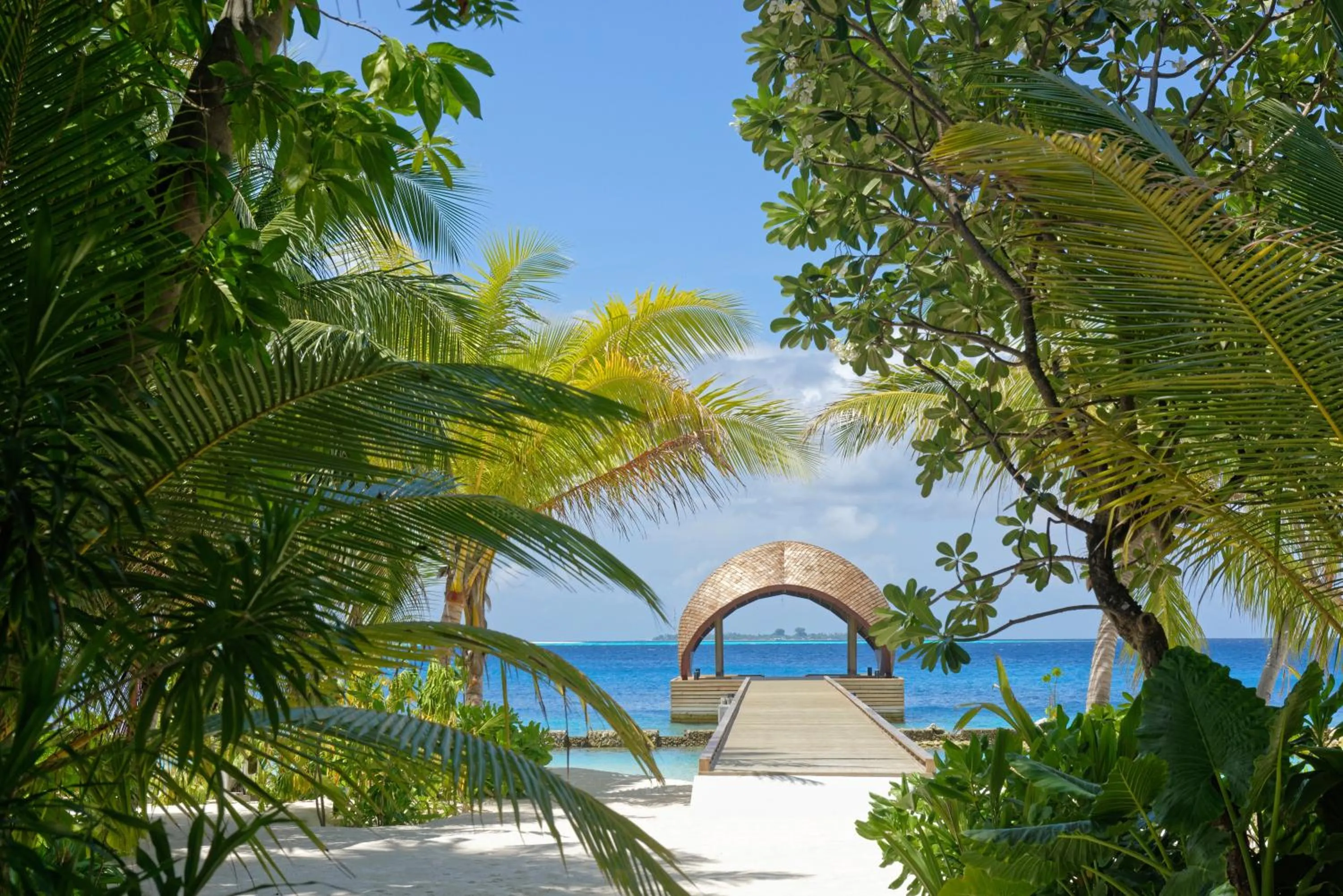 Lobby or reception in OUTRIGGER Maldives Maafushivaru Resort - 25 percent discount on transfers for min 4 nights stay and more, valid for reservations between 01 July till 22 Dec 2025