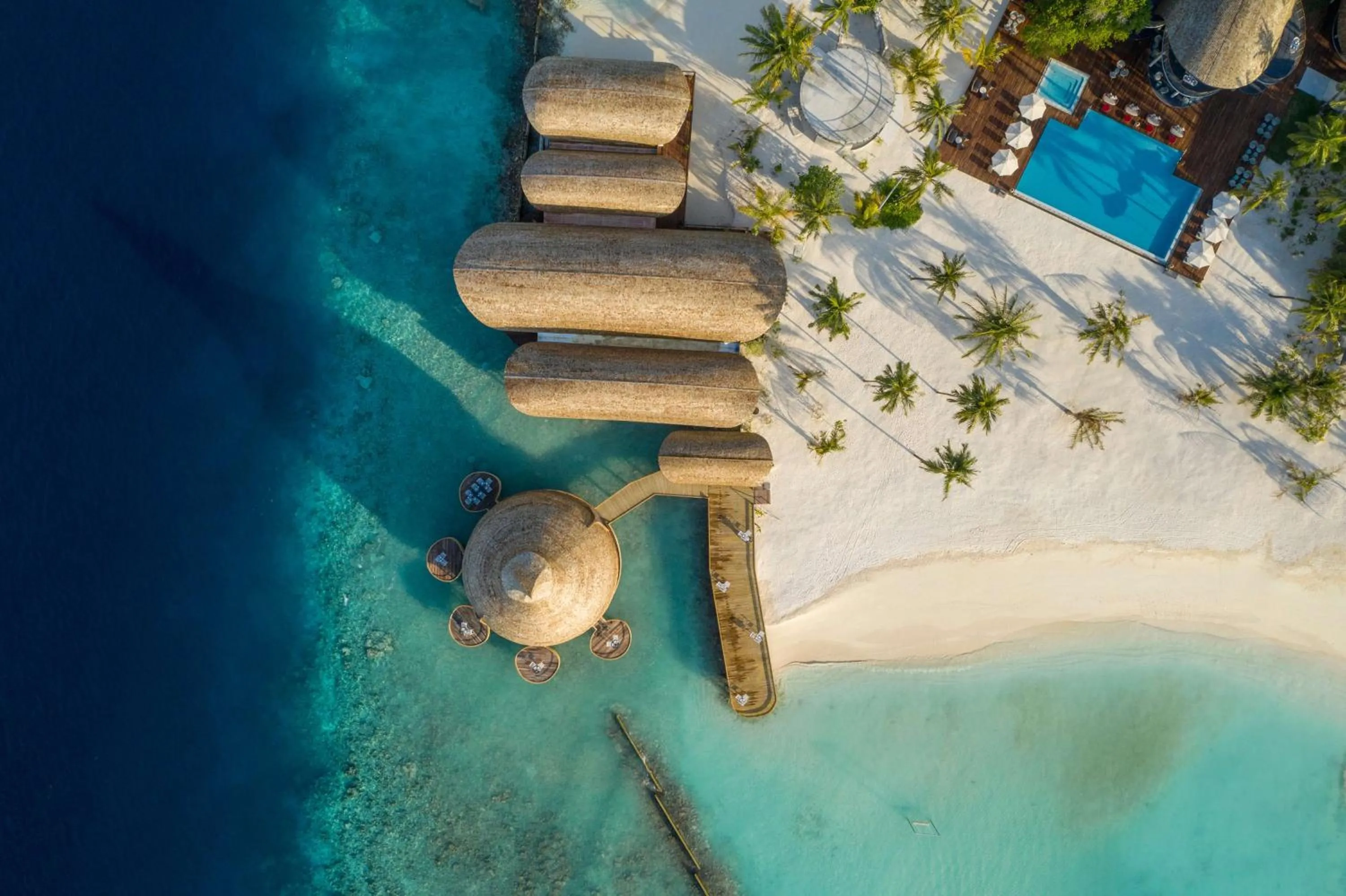 Property building in OUTRIGGER Maldives Maafushivaru Resort - 25 percent discount on transfers for min 4 nights stay and more, valid for reservations between 01 July till 22 Dec 2025