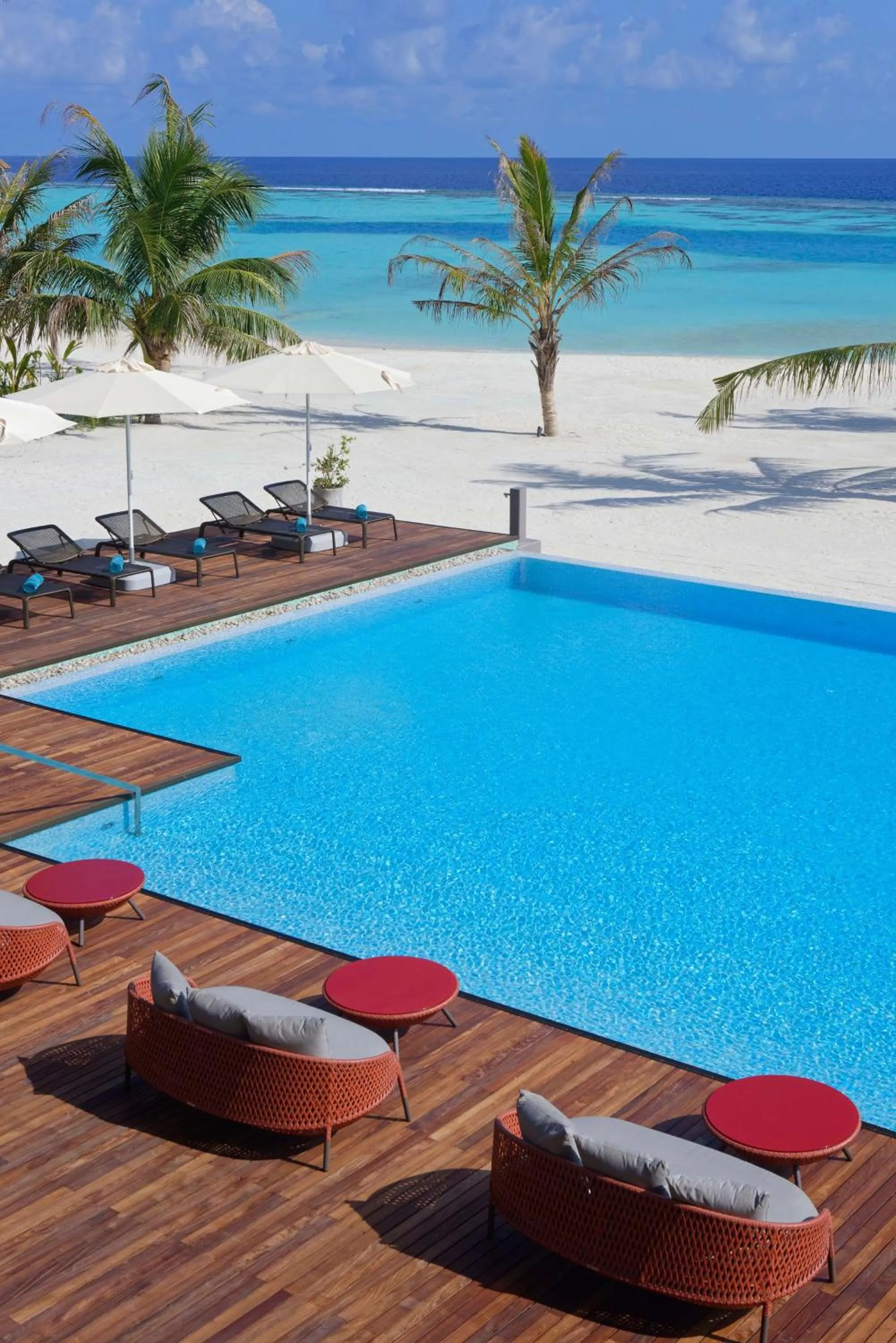 Pool view in OUTRIGGER Maldives Maafushivaru Resort - 25 percent discount on transfers for min 4 nights stay and more, valid for reservations between 01 July till 22 Dec 2025