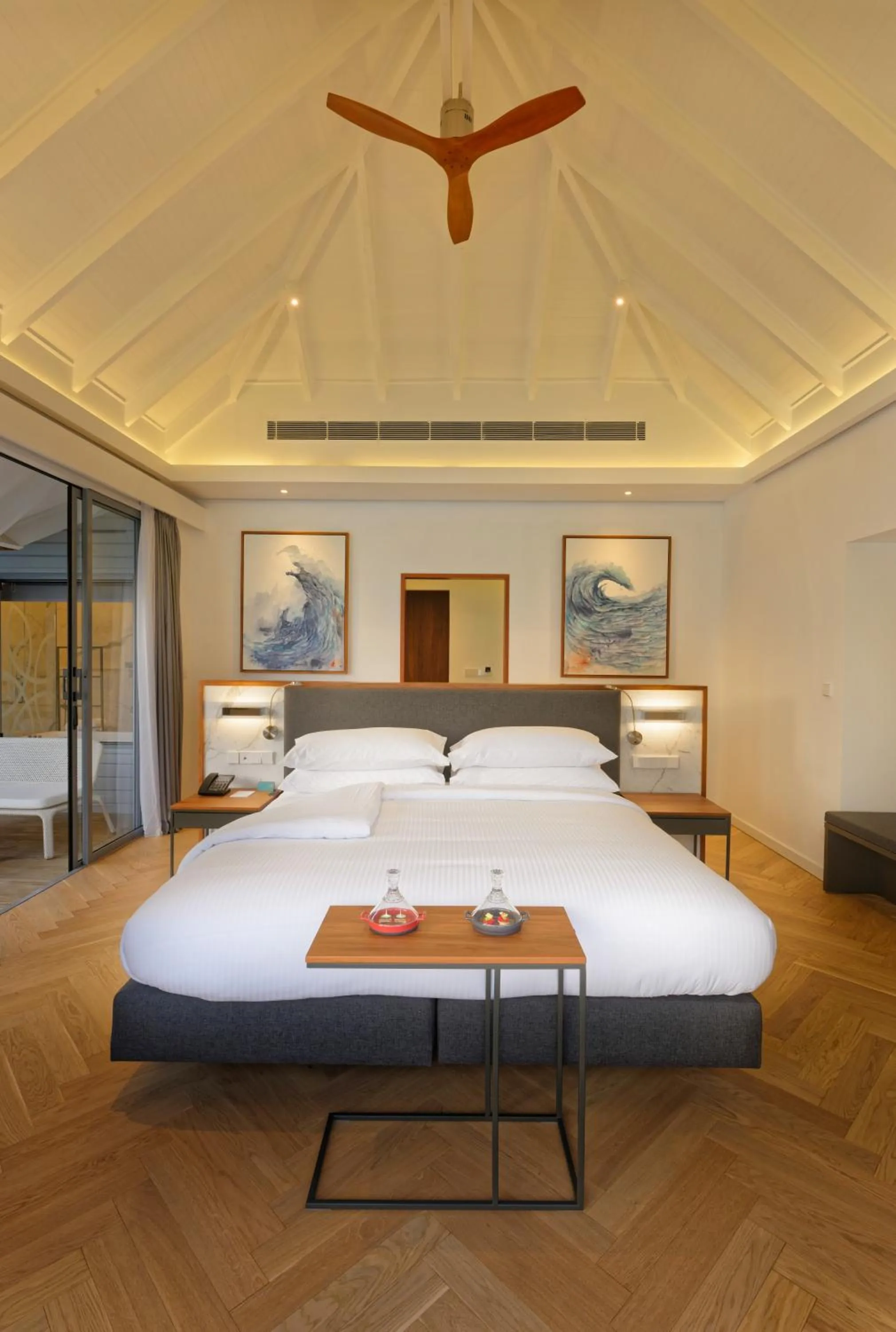 Bedroom, Bed in OUTRIGGER Maldives Maafushivaru Resort - 25 percent discount on transfers for min 4 nights stay and more, valid for reservations between 01 July till 22 Dec 2025