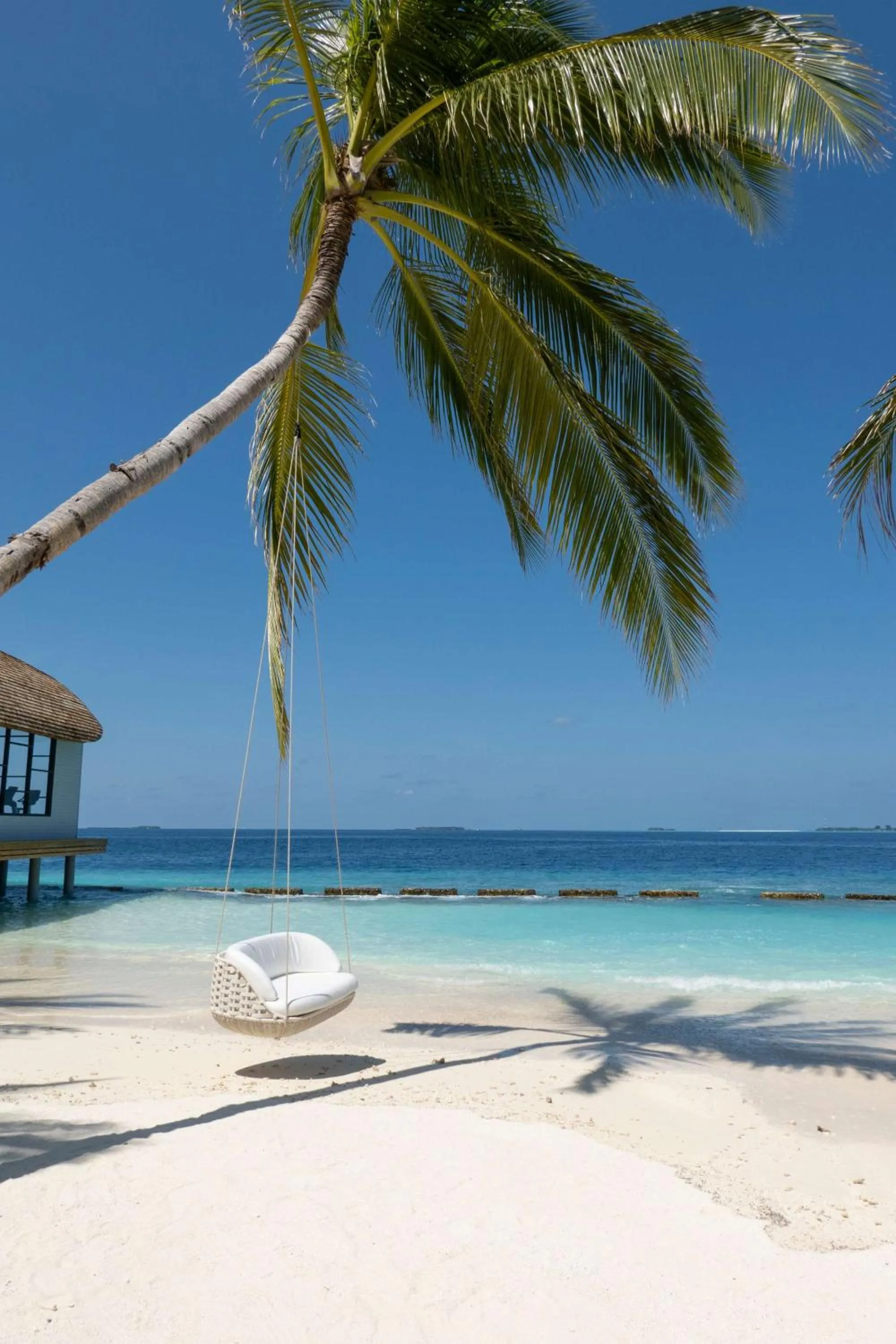 Beach in OUTRIGGER Maldives Maafushivaru Resort - 25 percent discount on transfers for min 4 nights stay and more, valid for reservations between 01 July till 22 Dec 2025