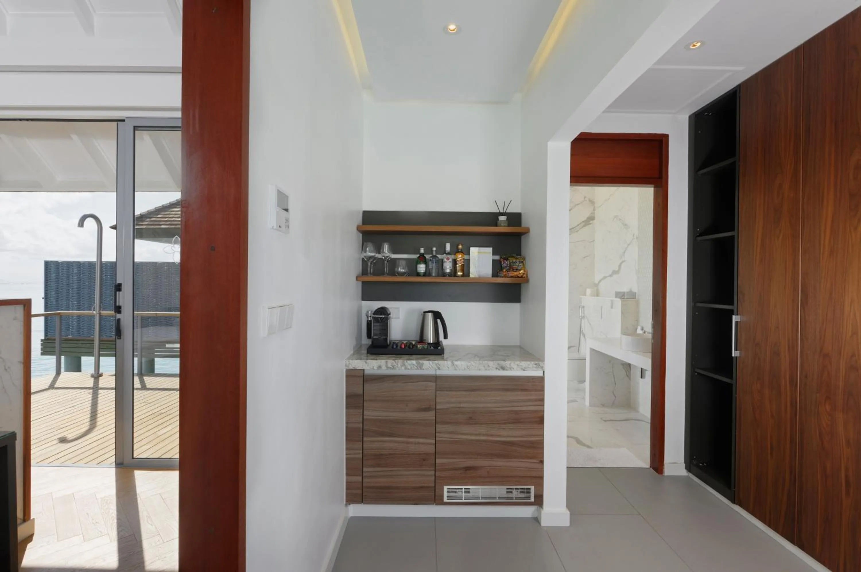 Coffee/tea facilities in OUTRIGGER Maldives Maafushivaru Resort - 25 percent discount on transfers for min 4 nights stay and more, valid for reservations between 01 July till 22 Dec 2025