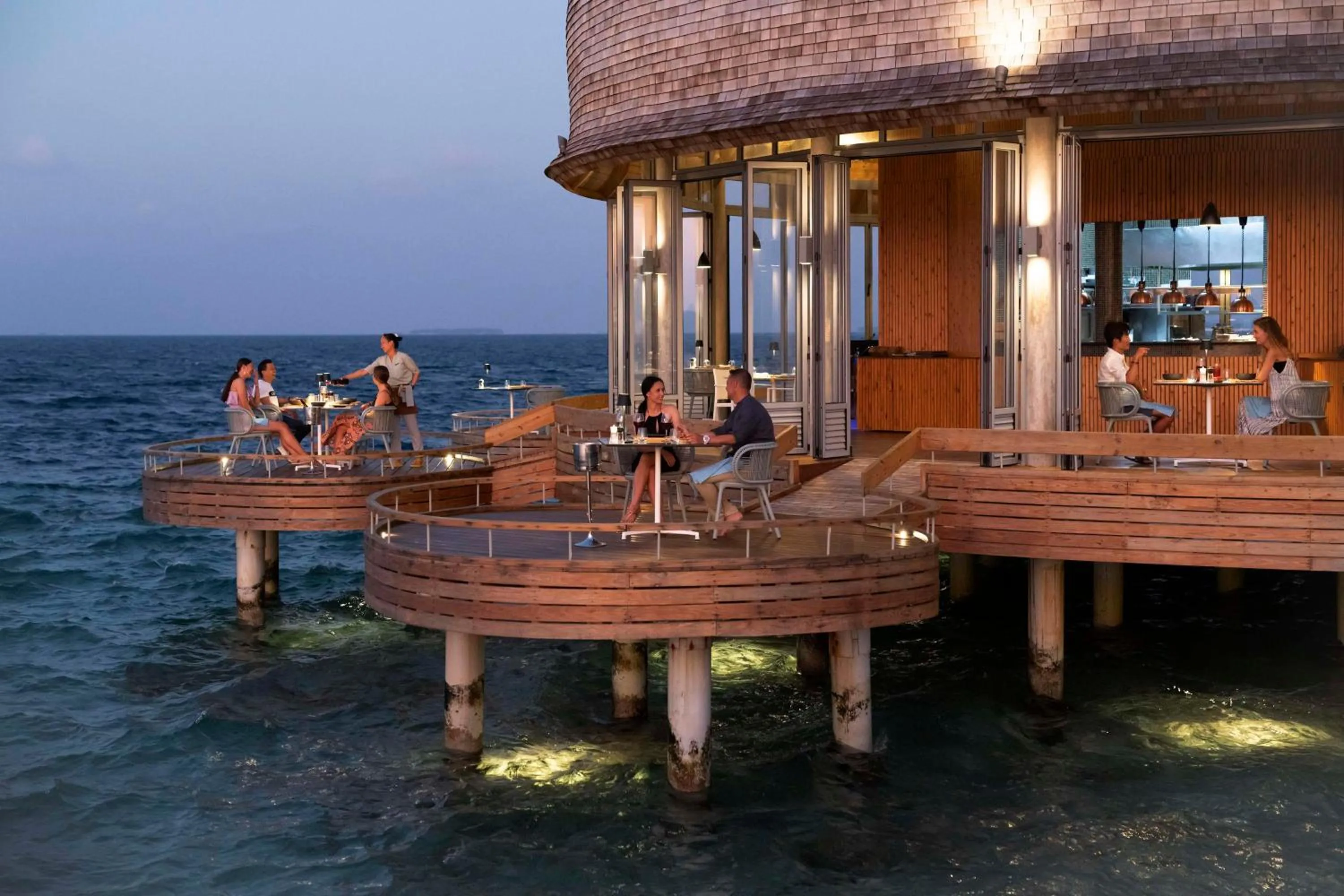 Restaurant/places to eat in OUTRIGGER Maldives Maafushivaru Resort - 25 percent discount on transfers for min 4 nights stay and more, valid for reservations between 01 July till 22 Dec 2025