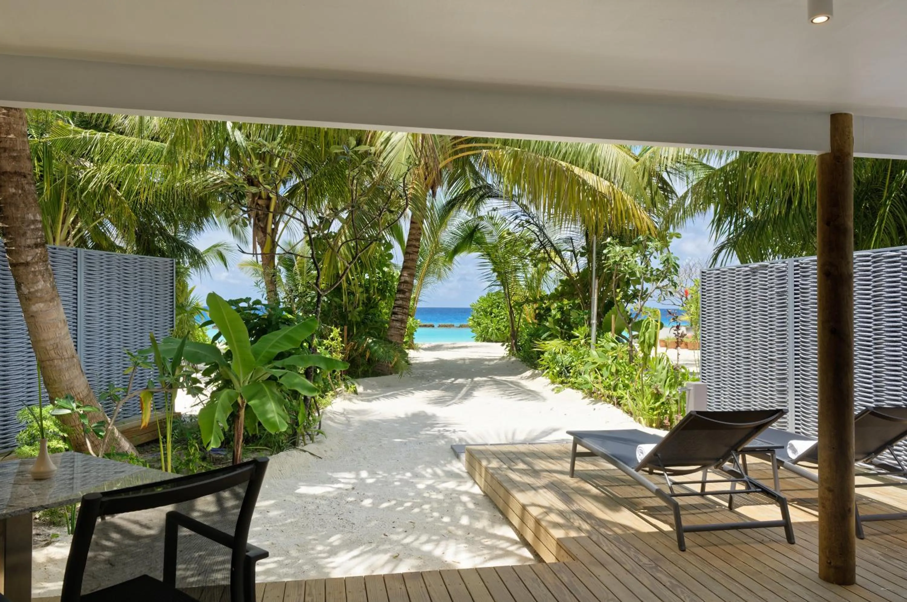 Balcony/Terrace in OUTRIGGER Maldives Maafushivaru Resort - 25 percent discount on transfers for min 4 nights stay and more, valid for reservations between 01 July till 22 Dec 2025