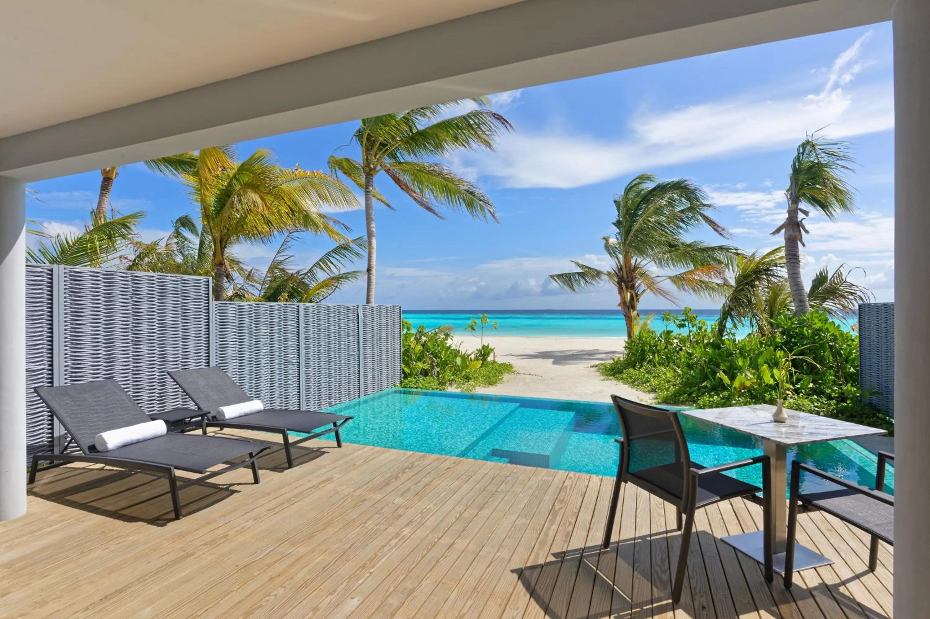 Balcony/Terrace in OUTRIGGER Maldives Maafushivaru Resort - 25 percent discount on transfers for min 4 nights stay and more, valid for reservations between 01 July till 22 Dec 2025
