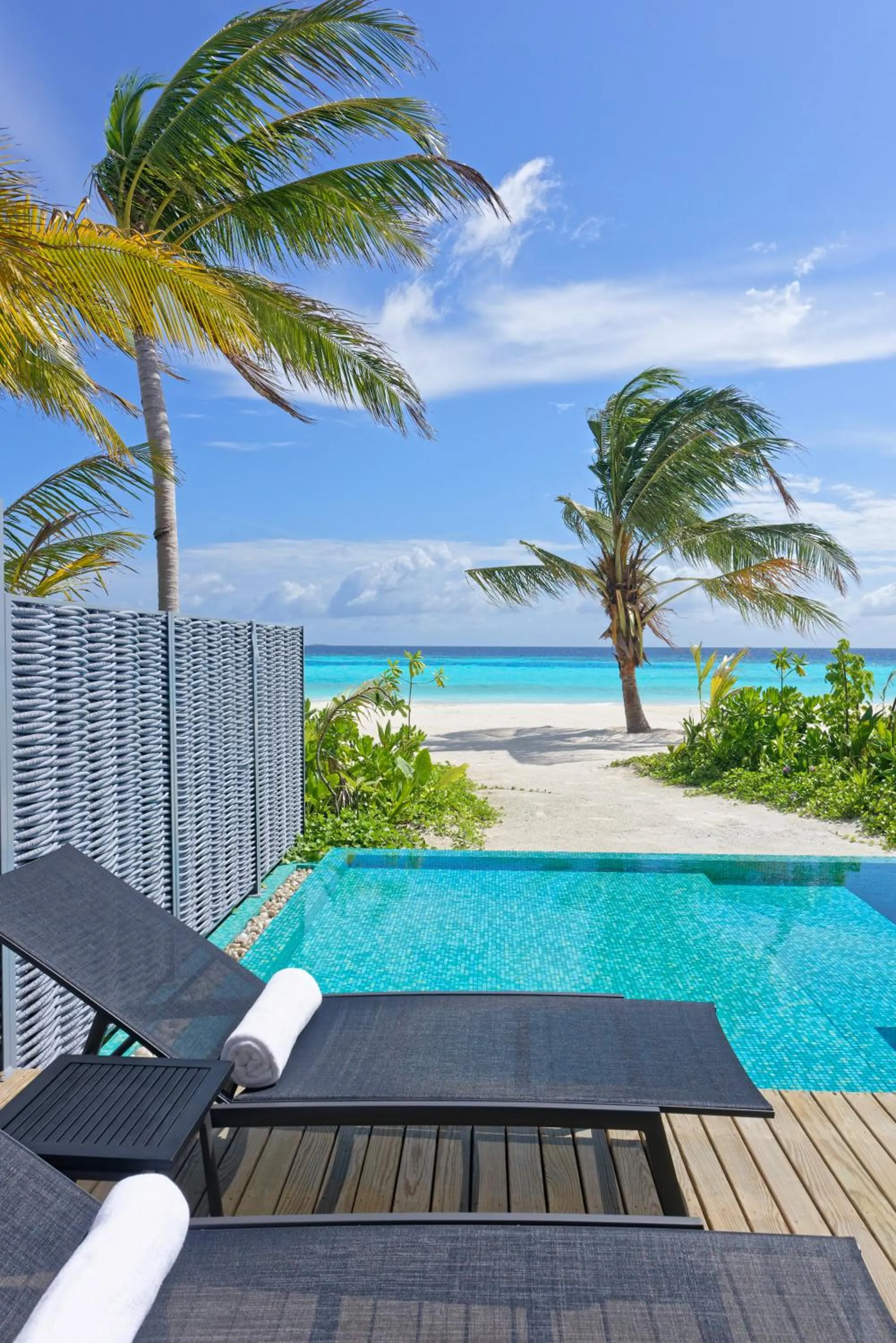 Balcony/Terrace in OUTRIGGER Maldives Maafushivaru Resort - 25 percent discount on transfers for min 4 nights stay and more, valid for reservations between 01 July till 22 Dec 2025