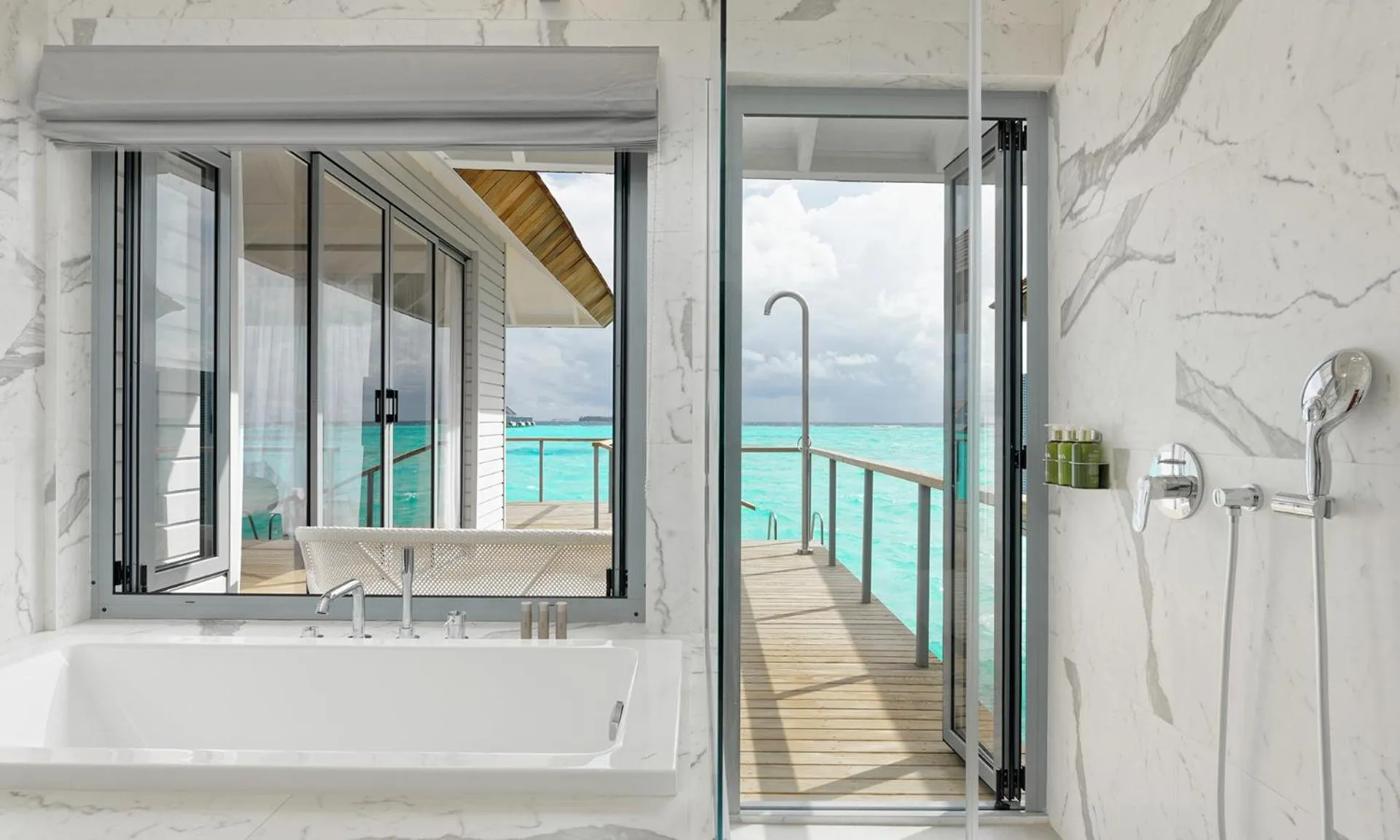Shower in OUTRIGGER Maldives Maafushivaru Resort - 25 percent discount on transfers for min 4 nights stay and more, valid for reservations between 01 July till 22 Dec 2025