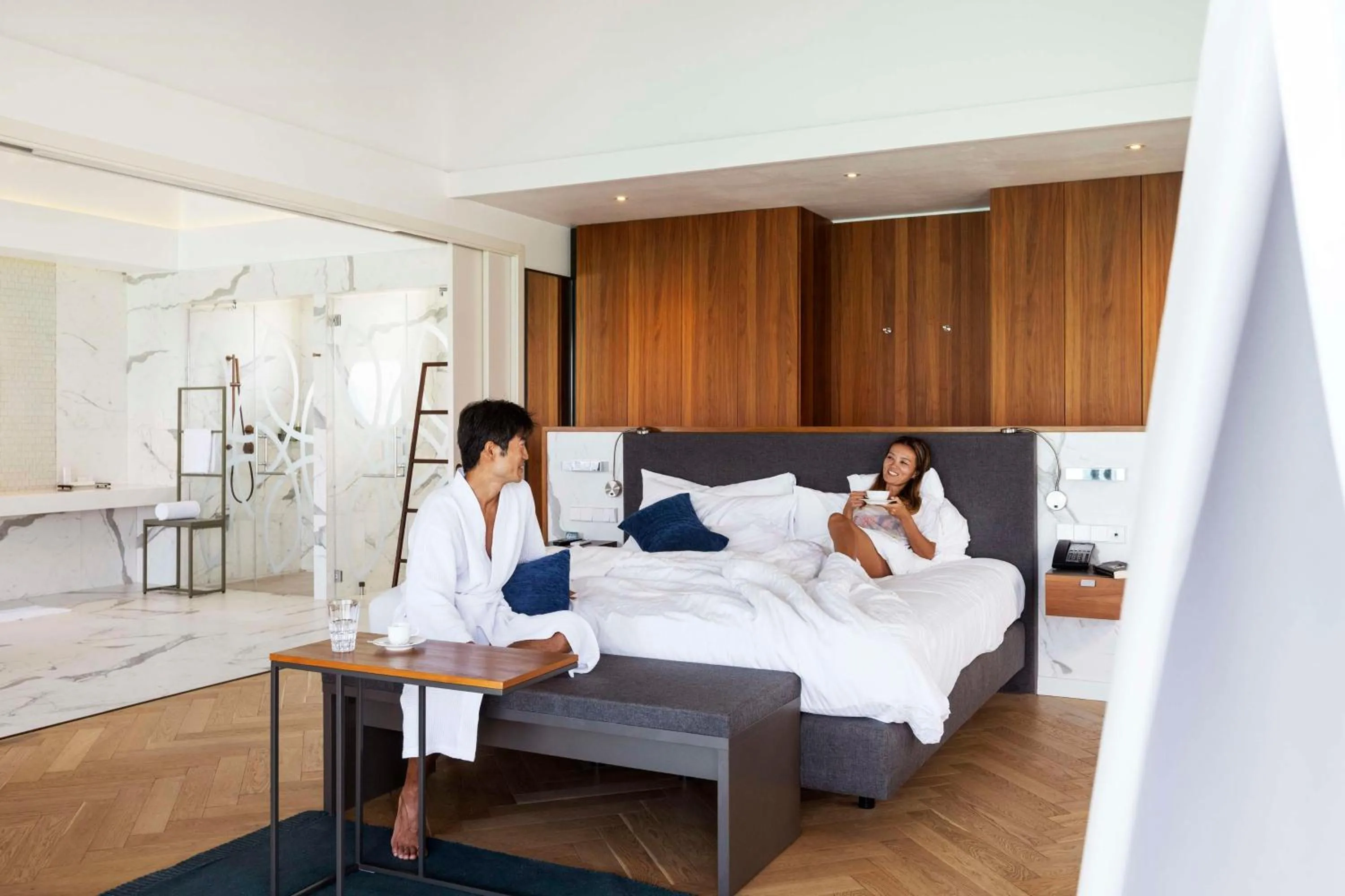 Photo of the whole room, Bed in OUTRIGGER Maldives Maafushivaru Resort - 25 percent discount on transfers for min 4 nights stay and more, valid for reservations between 01 July till 22 Dec 2025