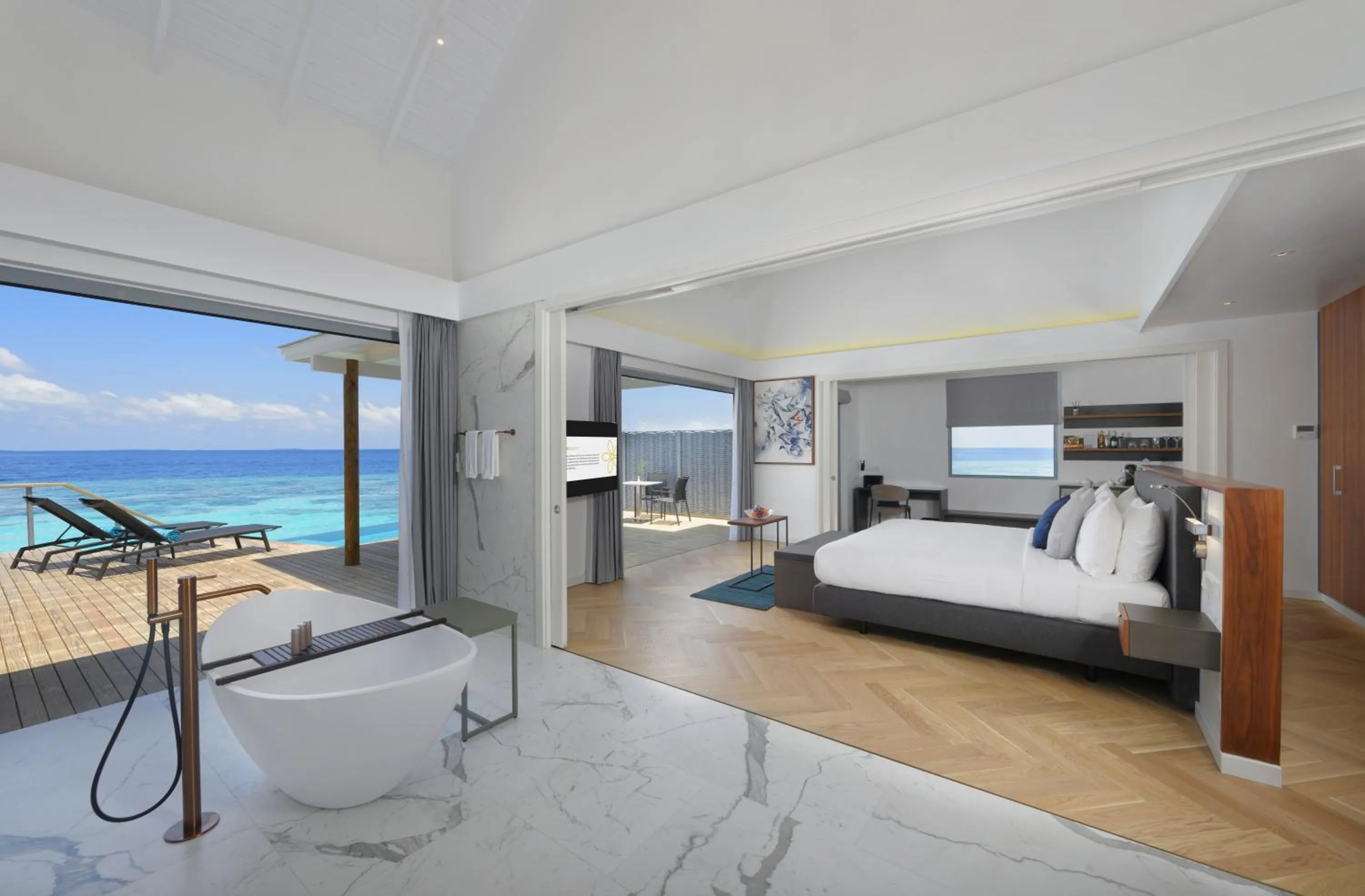 Bathroom, Bed in OUTRIGGER Maldives Maafushivaru Resort - 25 percent discount on transfers for min 4 nights stay and more, valid for reservations between 01 July till 22 Dec 2025