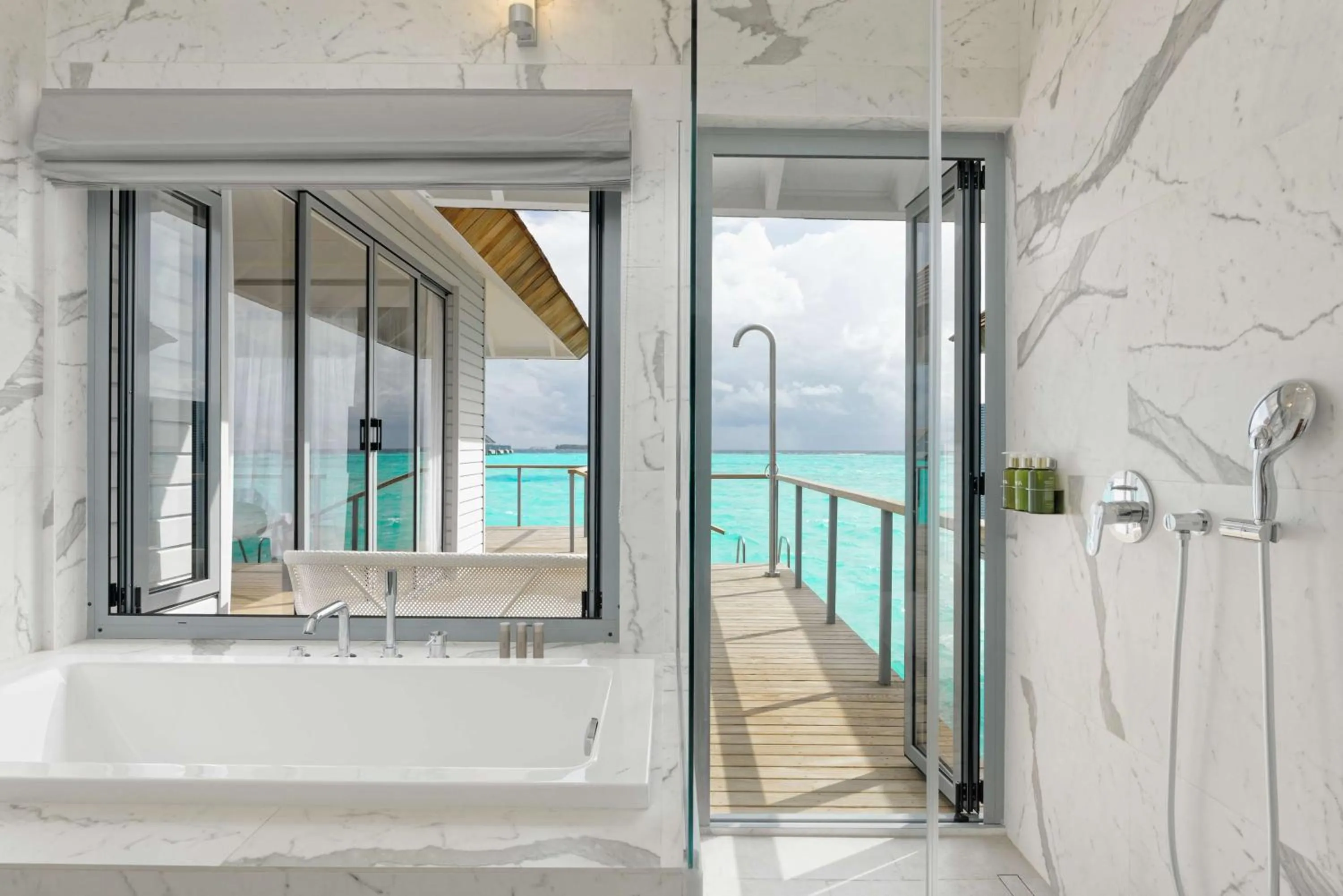 Bathroom in OUTRIGGER Maldives Maafushivaru Resort - 25 percent discount on transfers for min 4 nights stay and more, valid for reservations between 01 July till 22 Dec 2025
