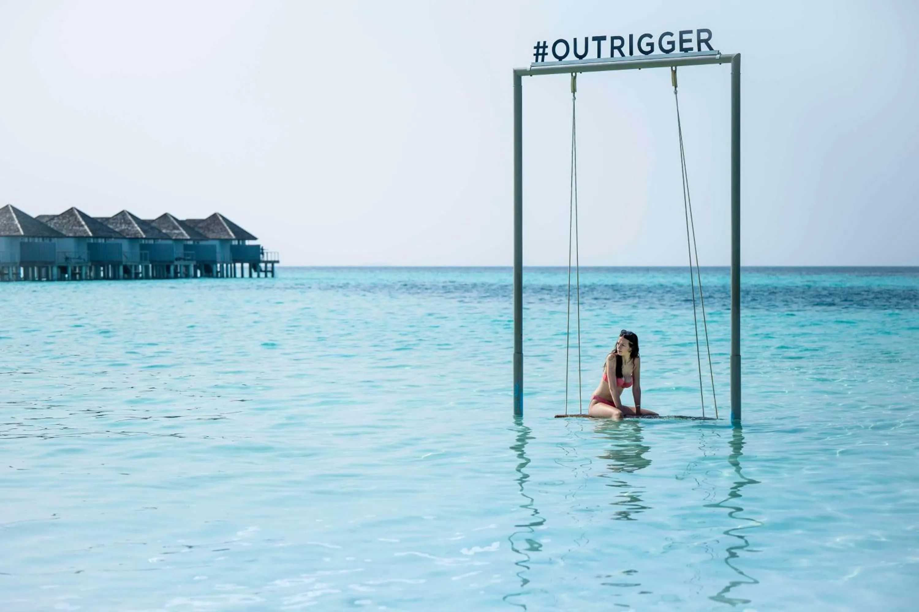 Beach in OUTRIGGER Maldives Maafushivaru Resort - 25 percent discount on transfers for min 4 nights stay and more, valid for reservations between 01 July till 22 Dec 2025