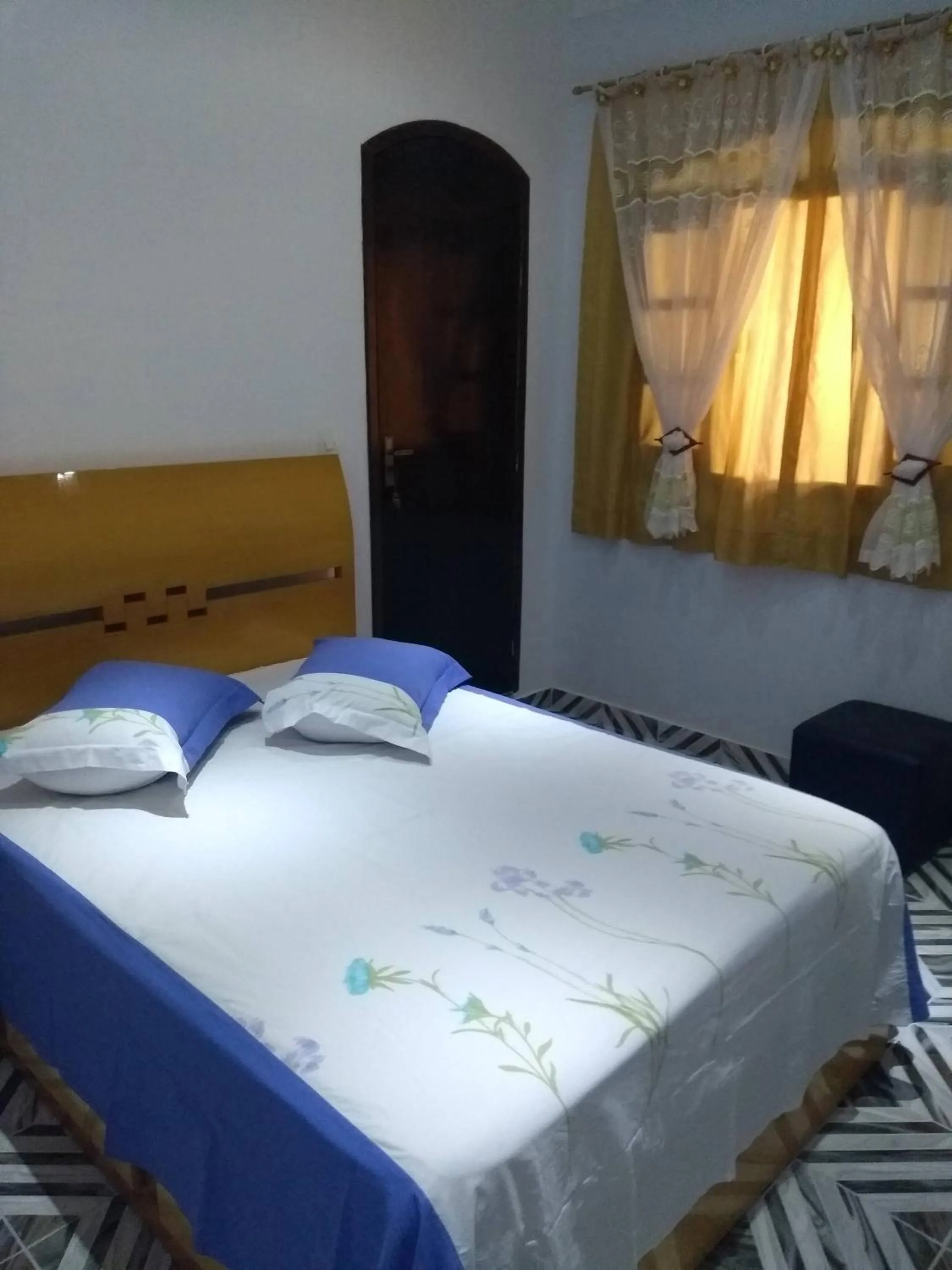 Bed in Pousada Guarulhos