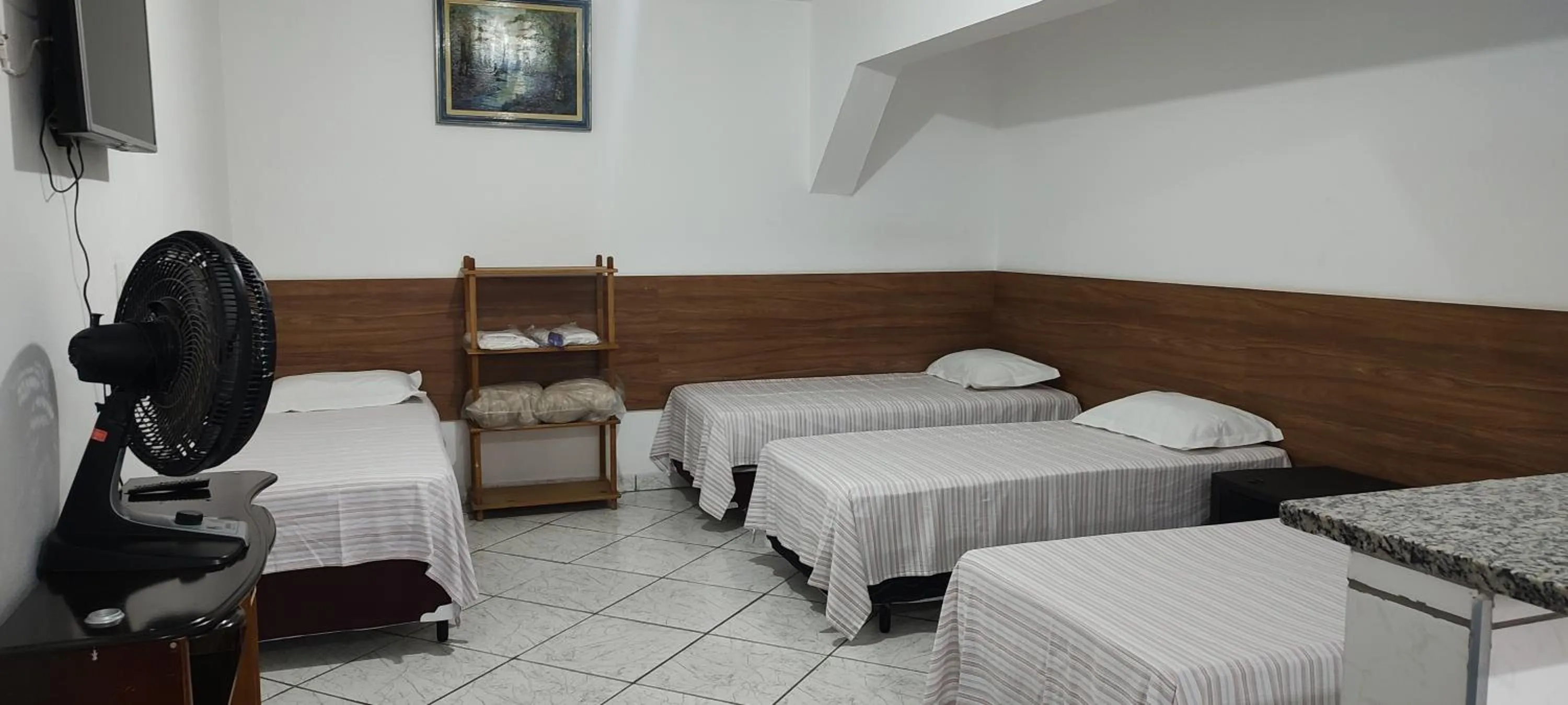 Bed in Pousada Guarulhos