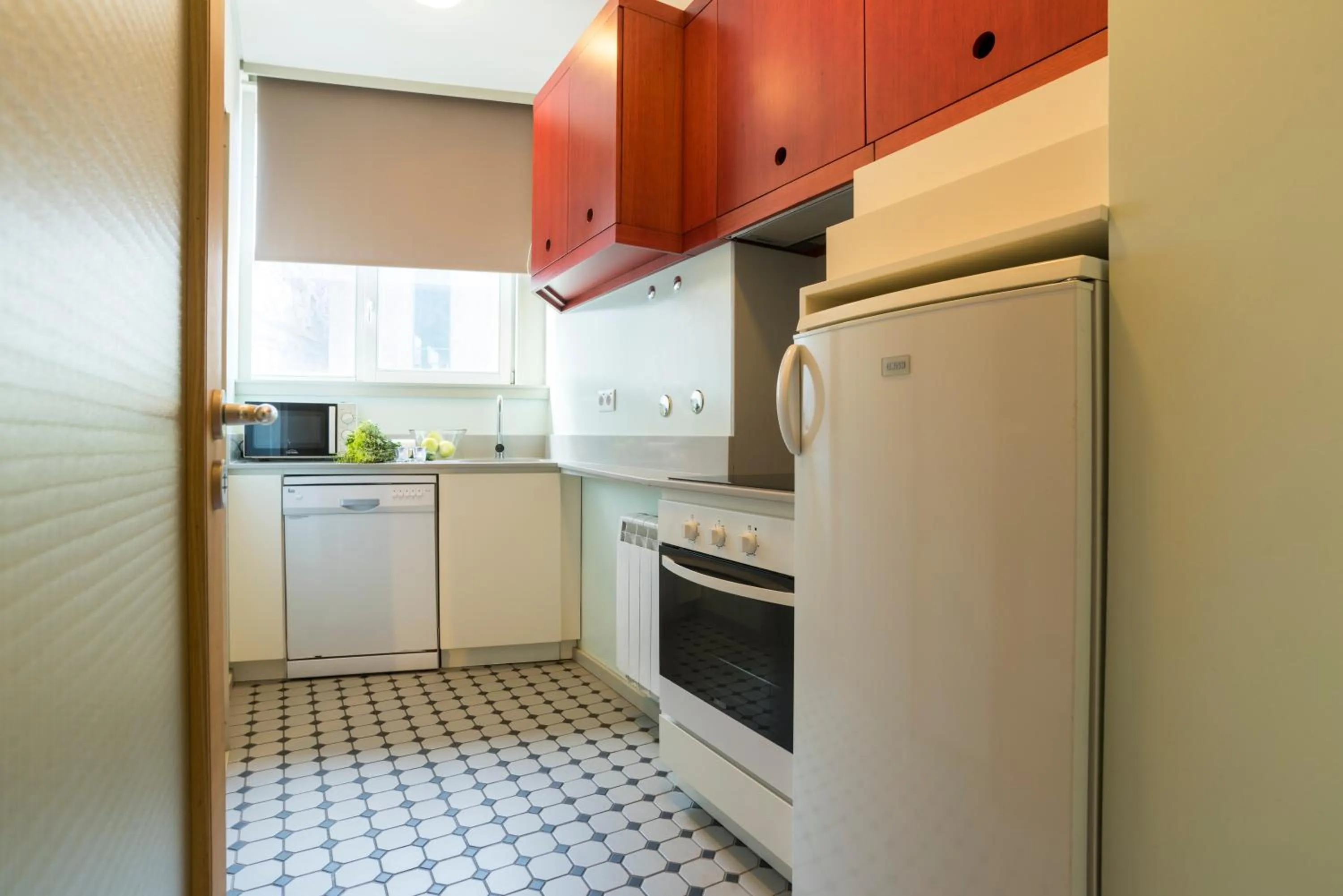 Kitchen or kitchenette in bnapartments Trindade