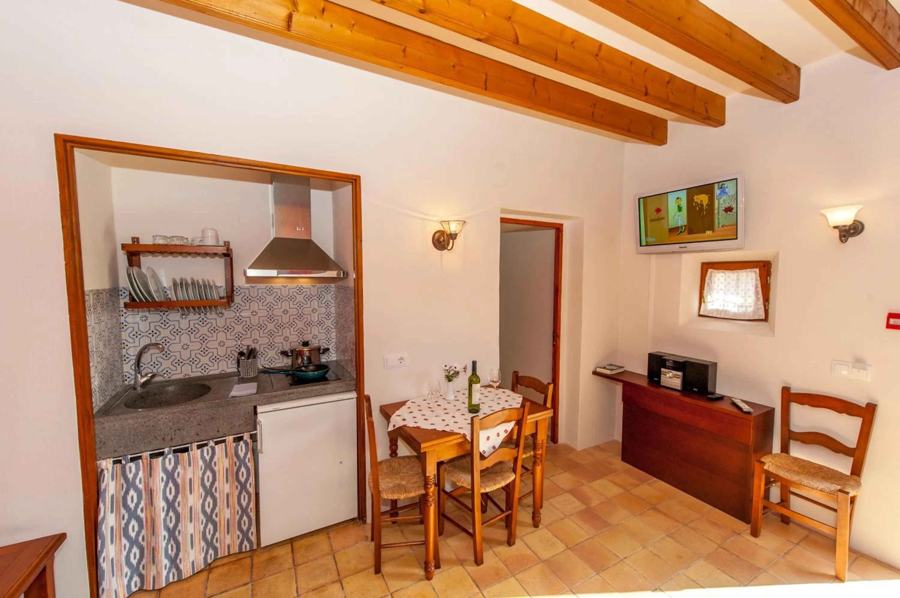 Kitchen or kitchenette in Finca Hotel Ses Cases Noves