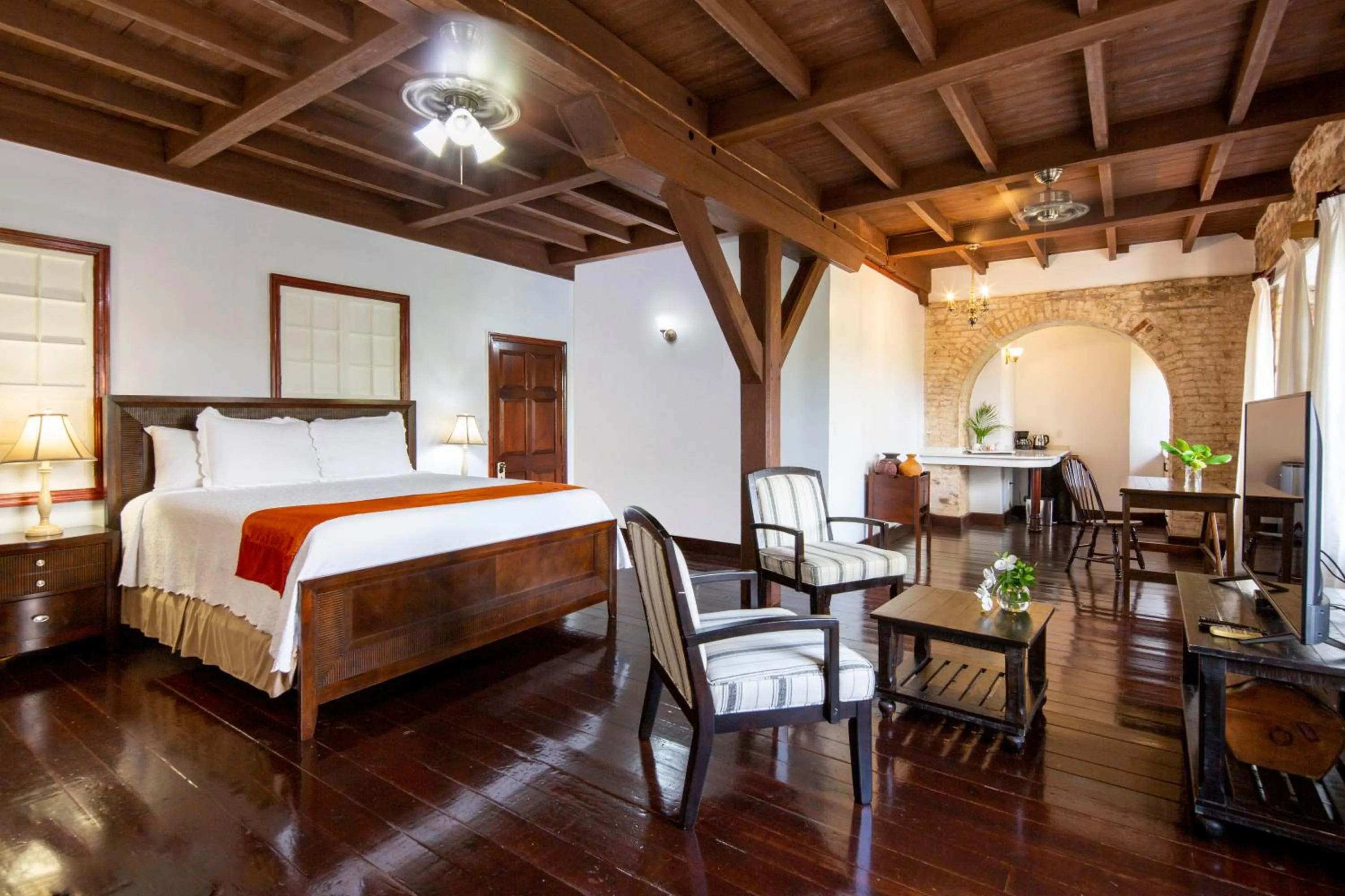 Seating area, Bed in Copper and Lumber Store Hotel