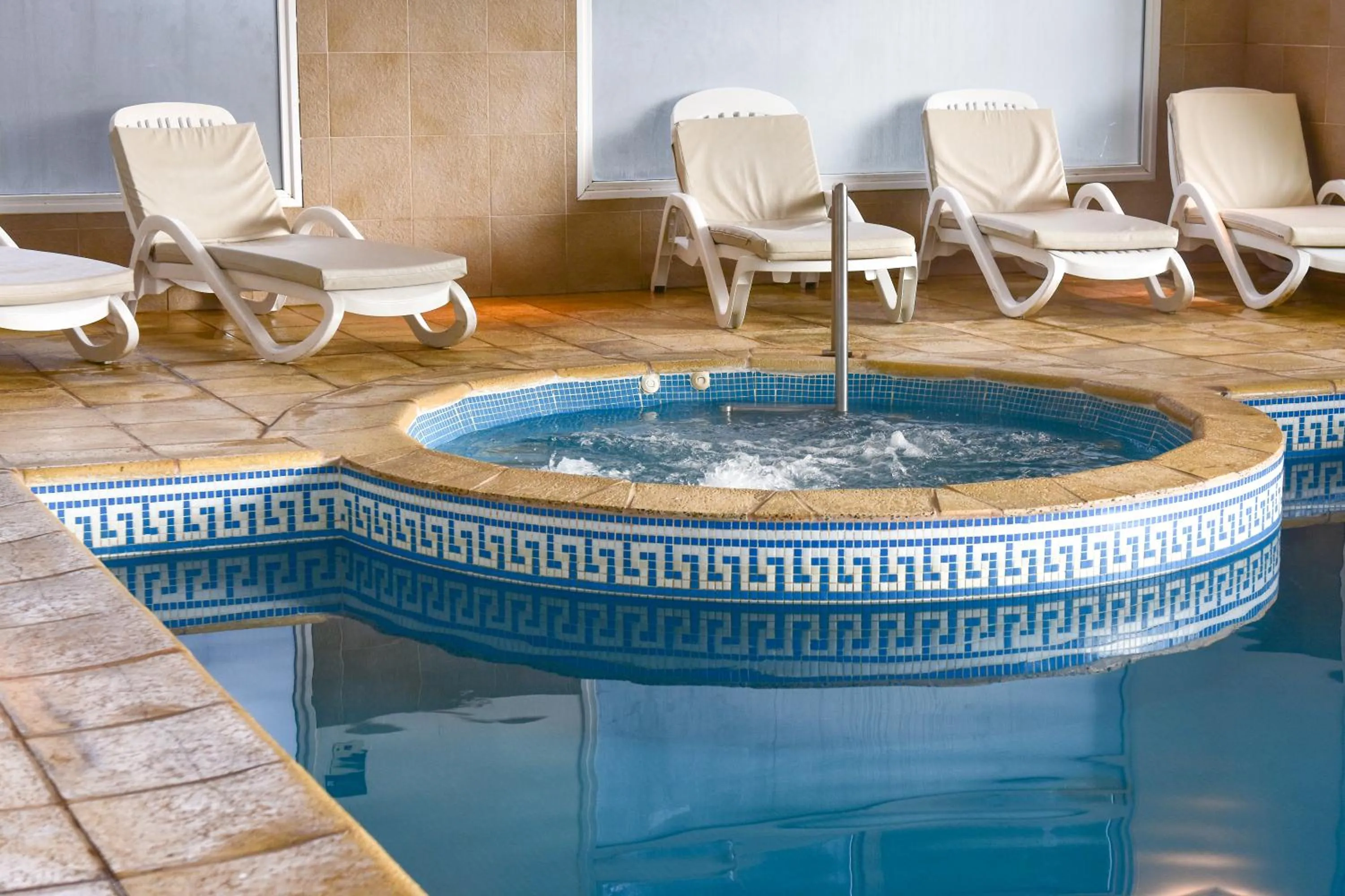 Swimming pool in Huinid Pioneros Hotel & Aparts