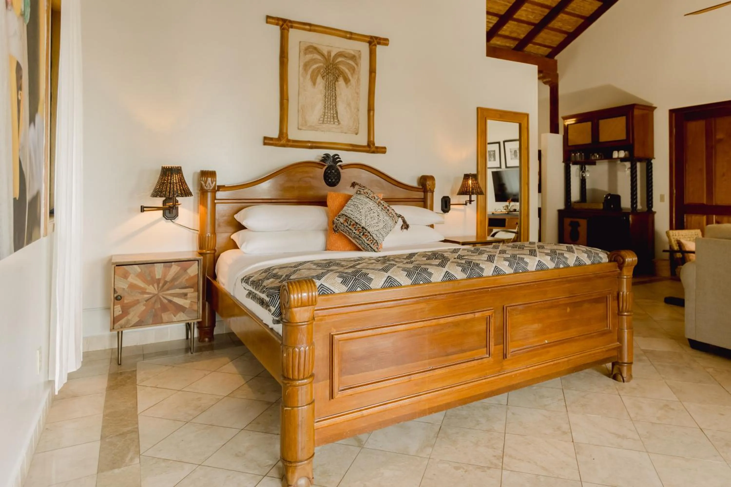 Bed in Almond Beach Resort at Jaguar Reef