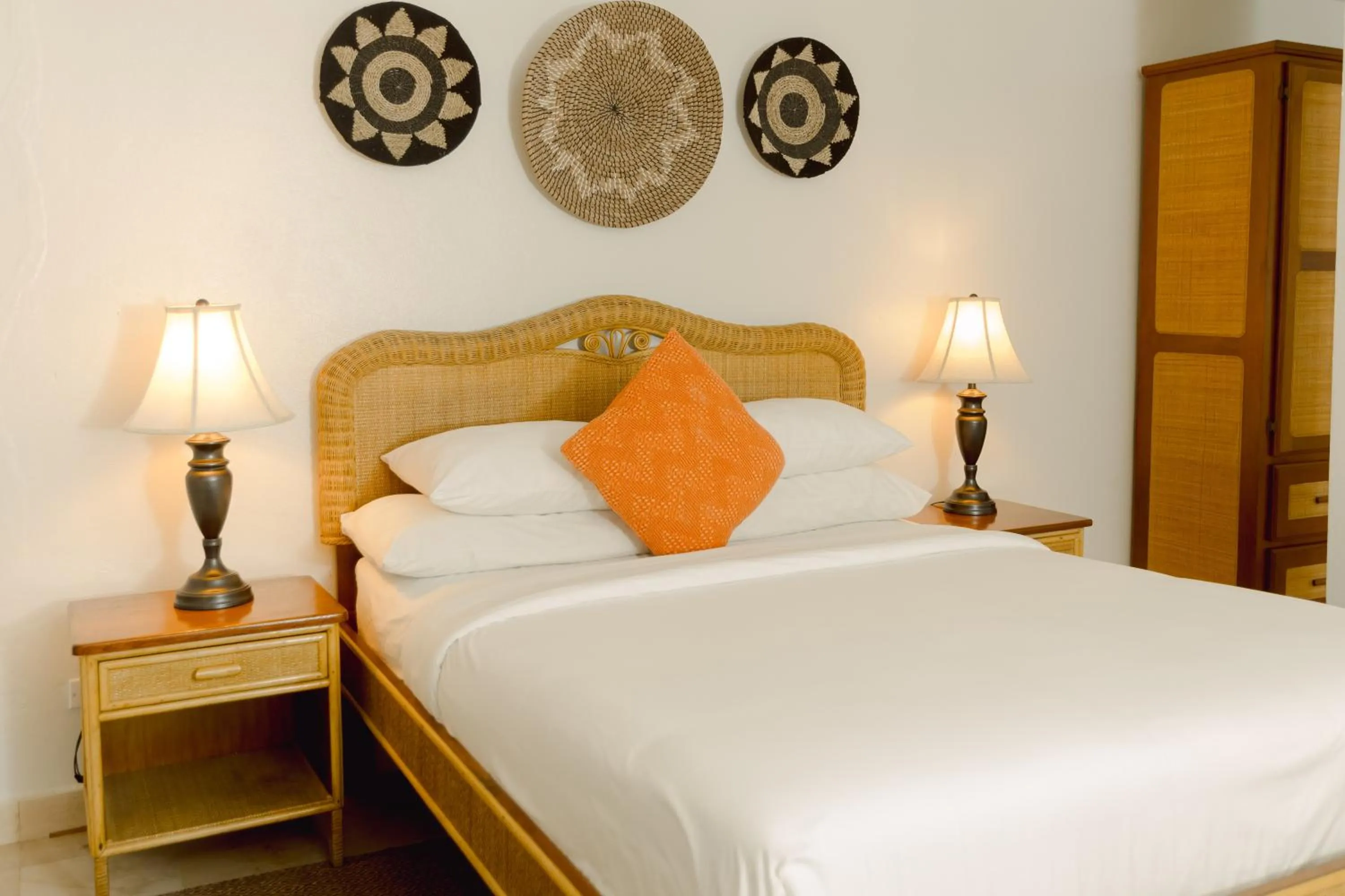 Bed in Almond Beach Resort at Jaguar Reef