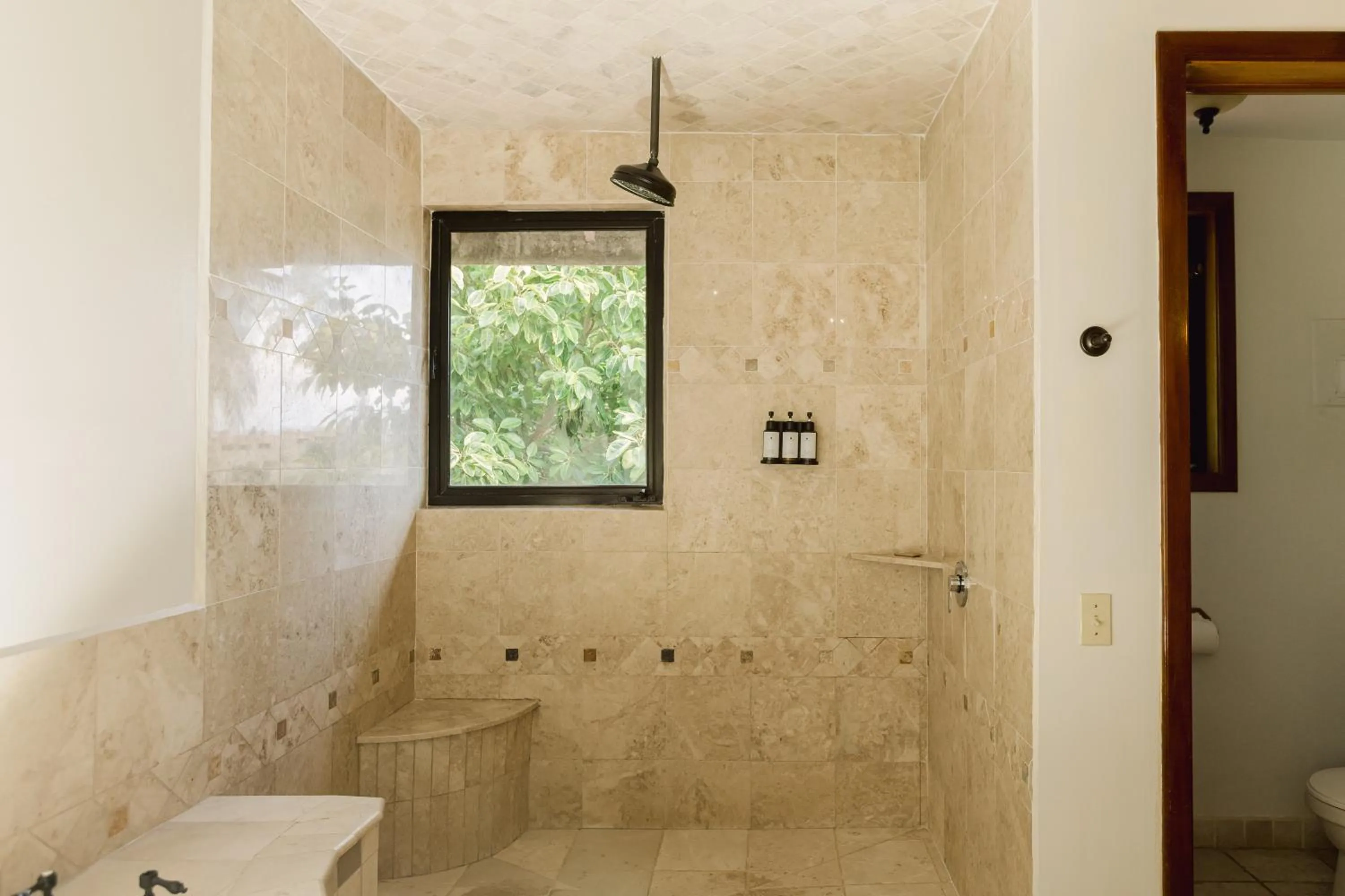 Bathroom in Almond Beach Resort at Jaguar Reef