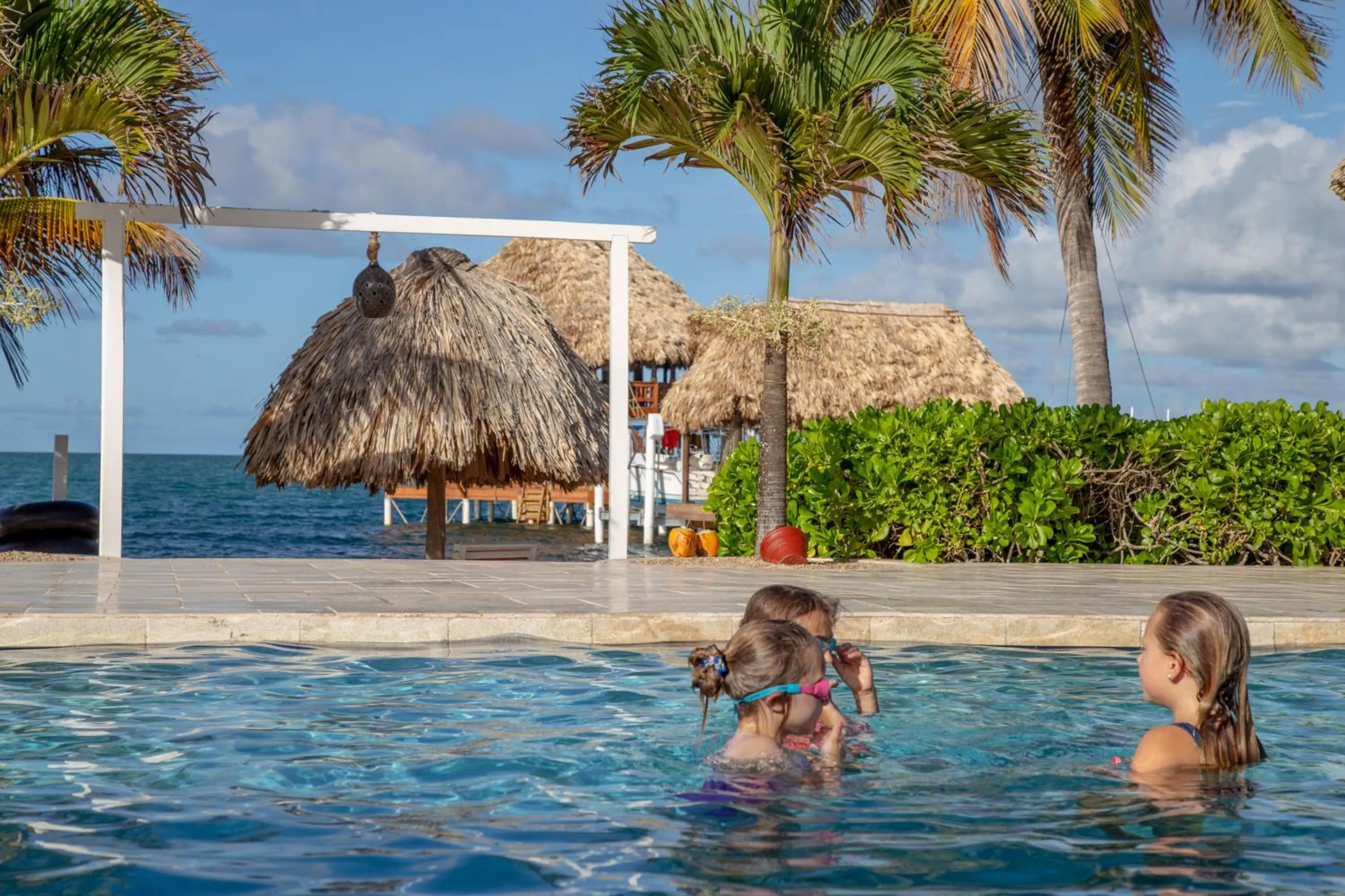 People in Almond Beach Resort at Jaguar Reef
