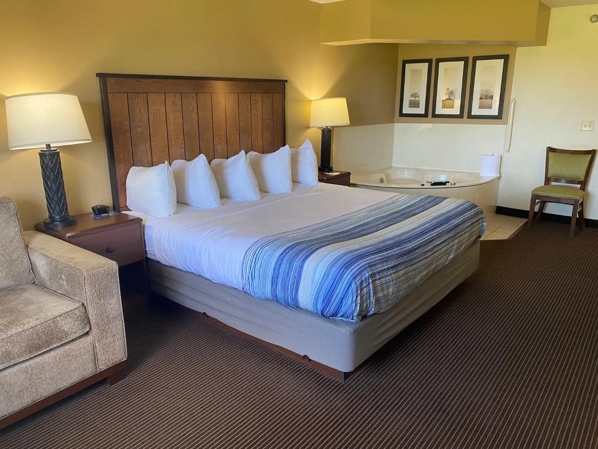 Bed in AmericInn by Wyndham Two Harbors Near Lake Superior