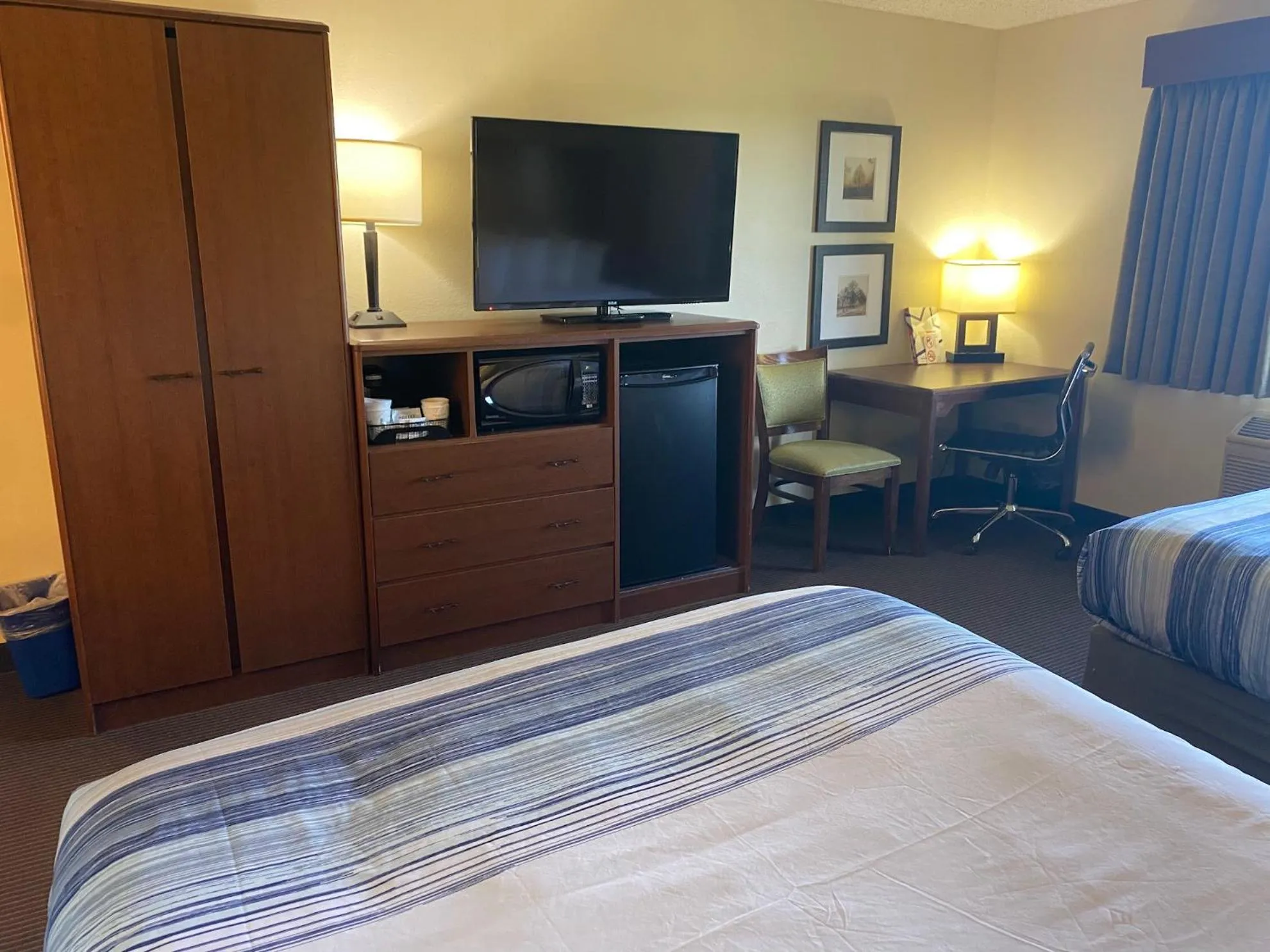 Bed in AmericInn by Wyndham Two Harbors Near Lake Superior