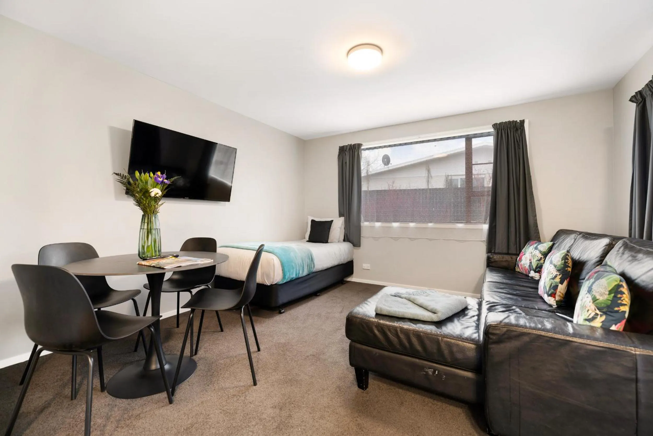 Bed in Arrowtown Motel