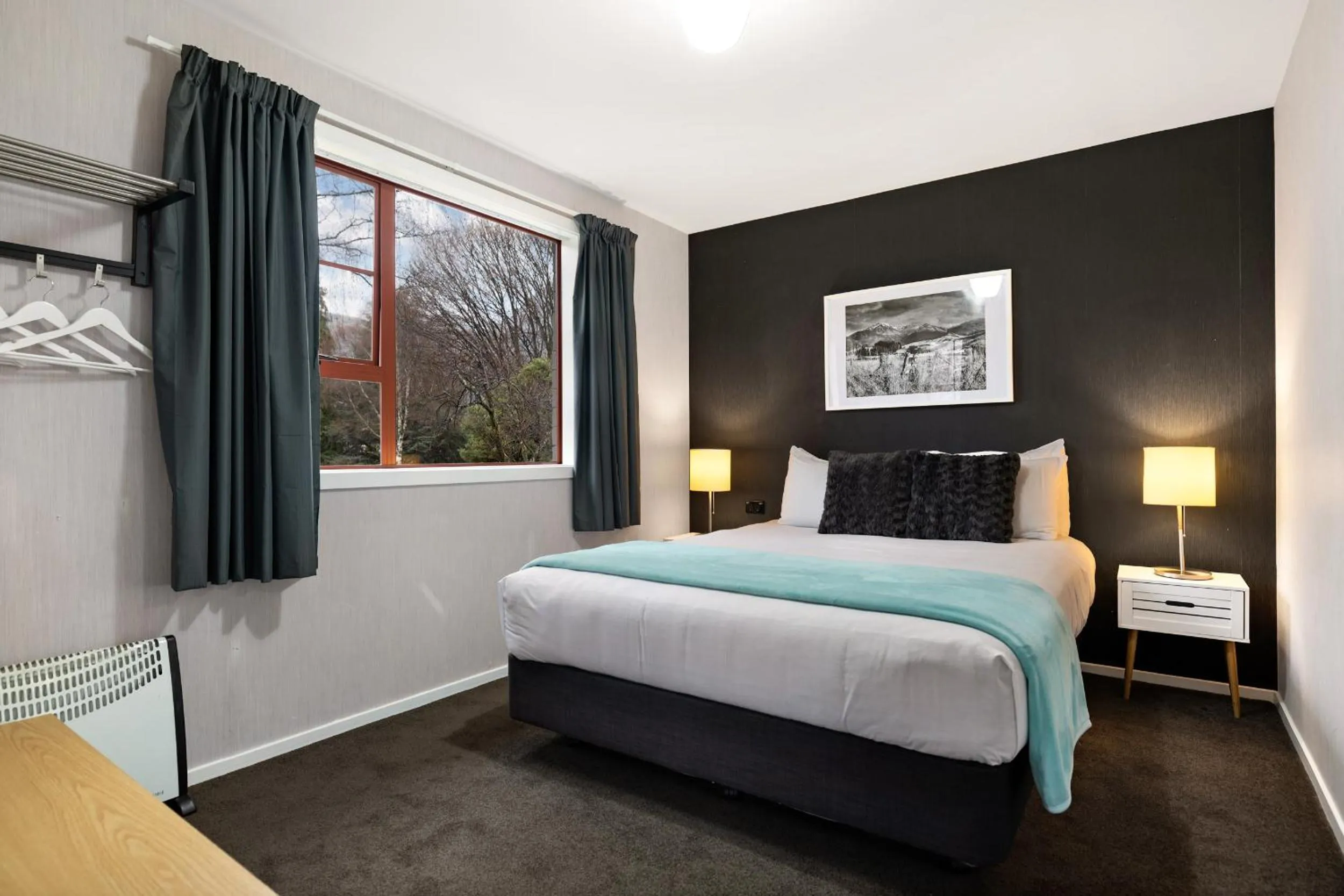 Bed in Arrowtown Motel