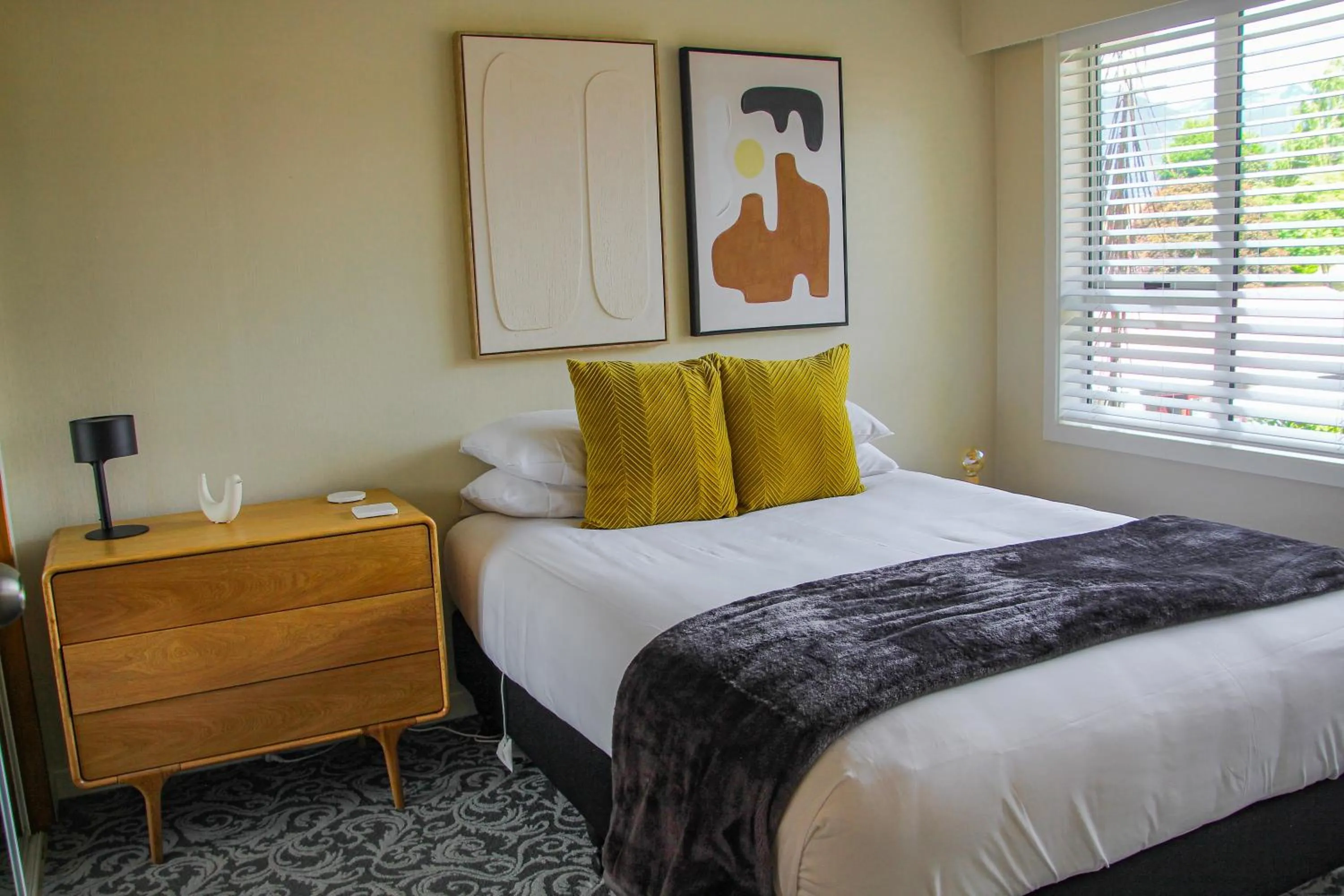 Bed in Arrowtown Motel