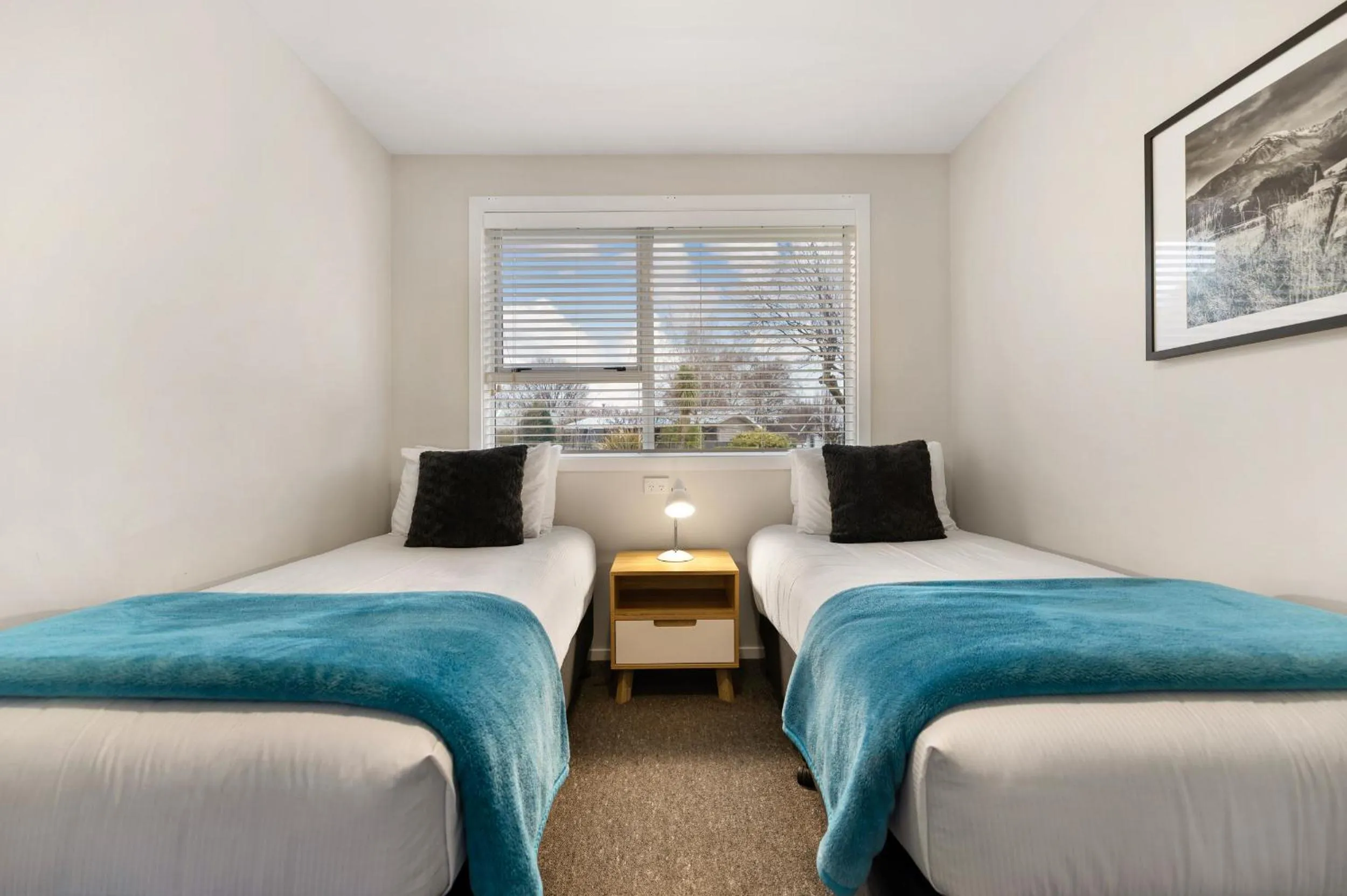 Bed in Arrowtown Motel