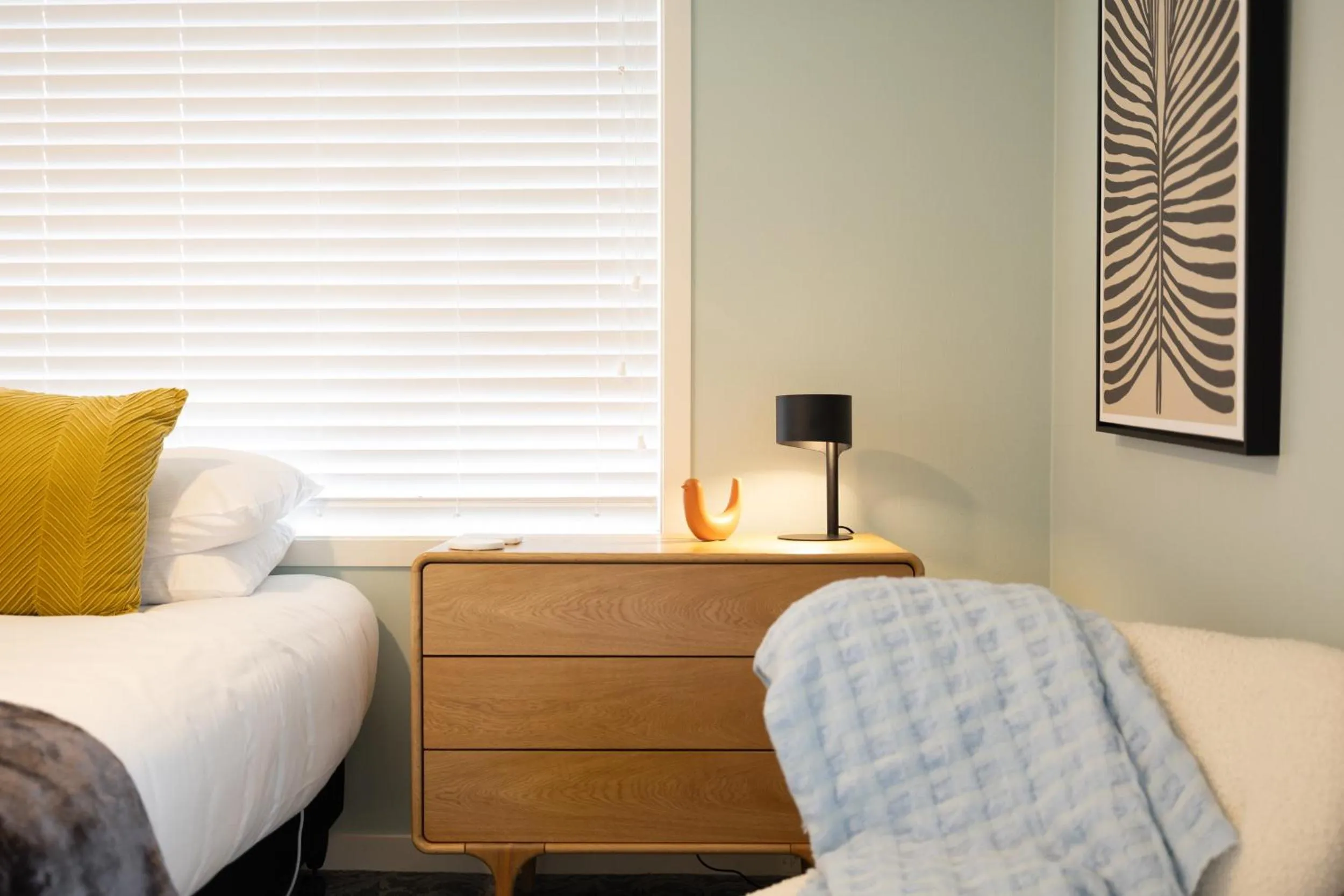 Bed in Arrowtown Motel