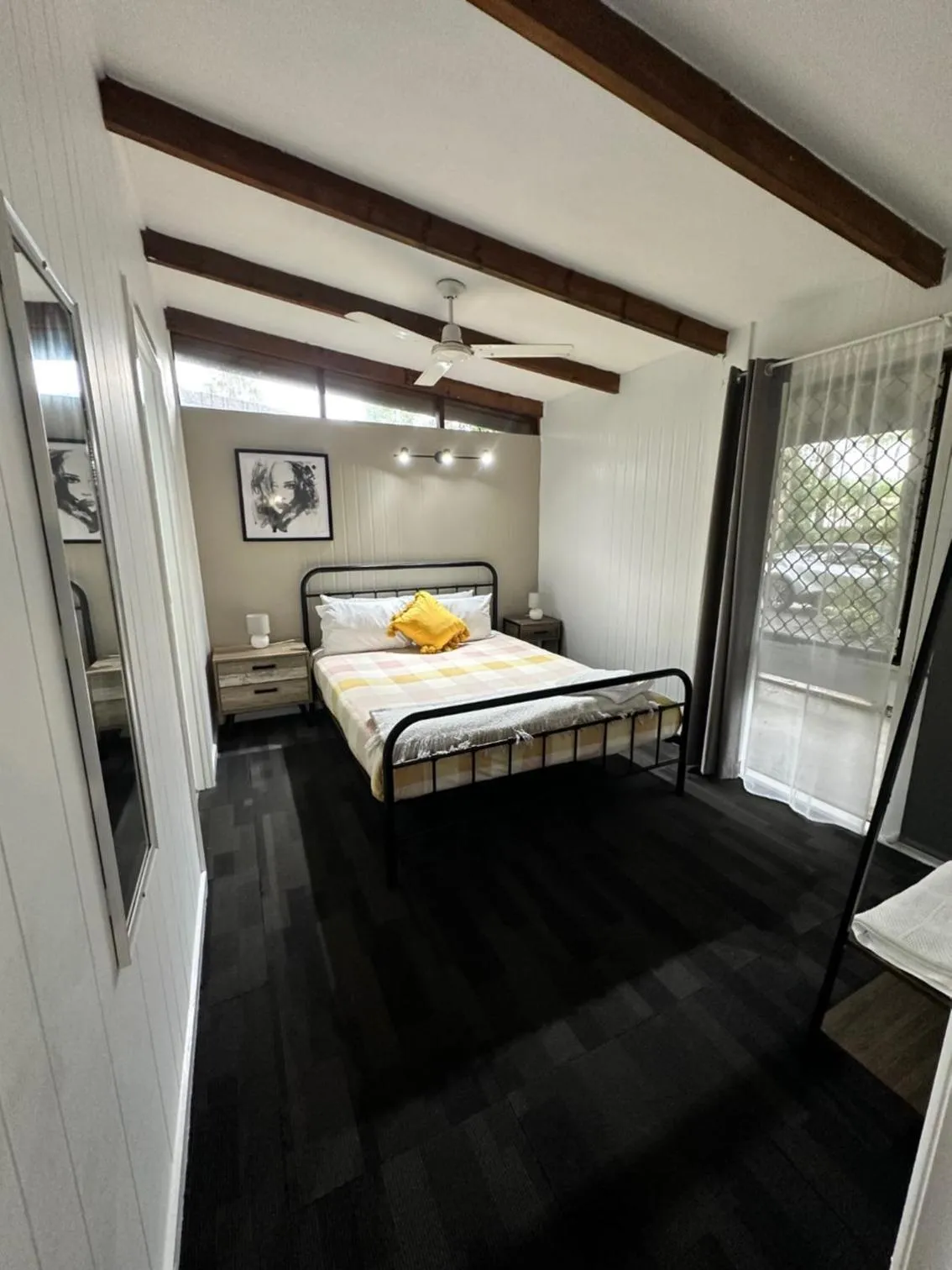 Bed in Colonial Village Resort