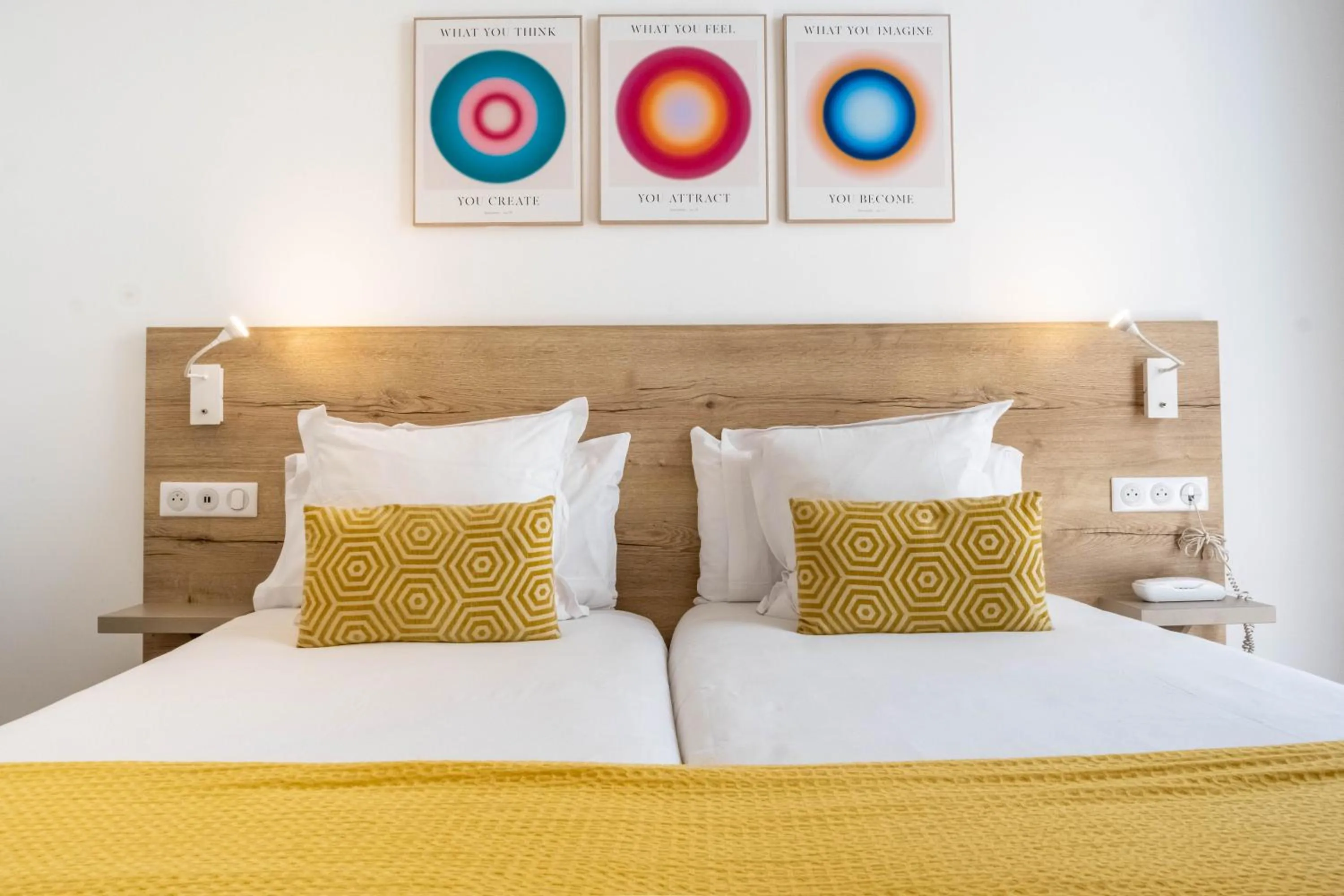 Bed in Hôtel de la Fontaine