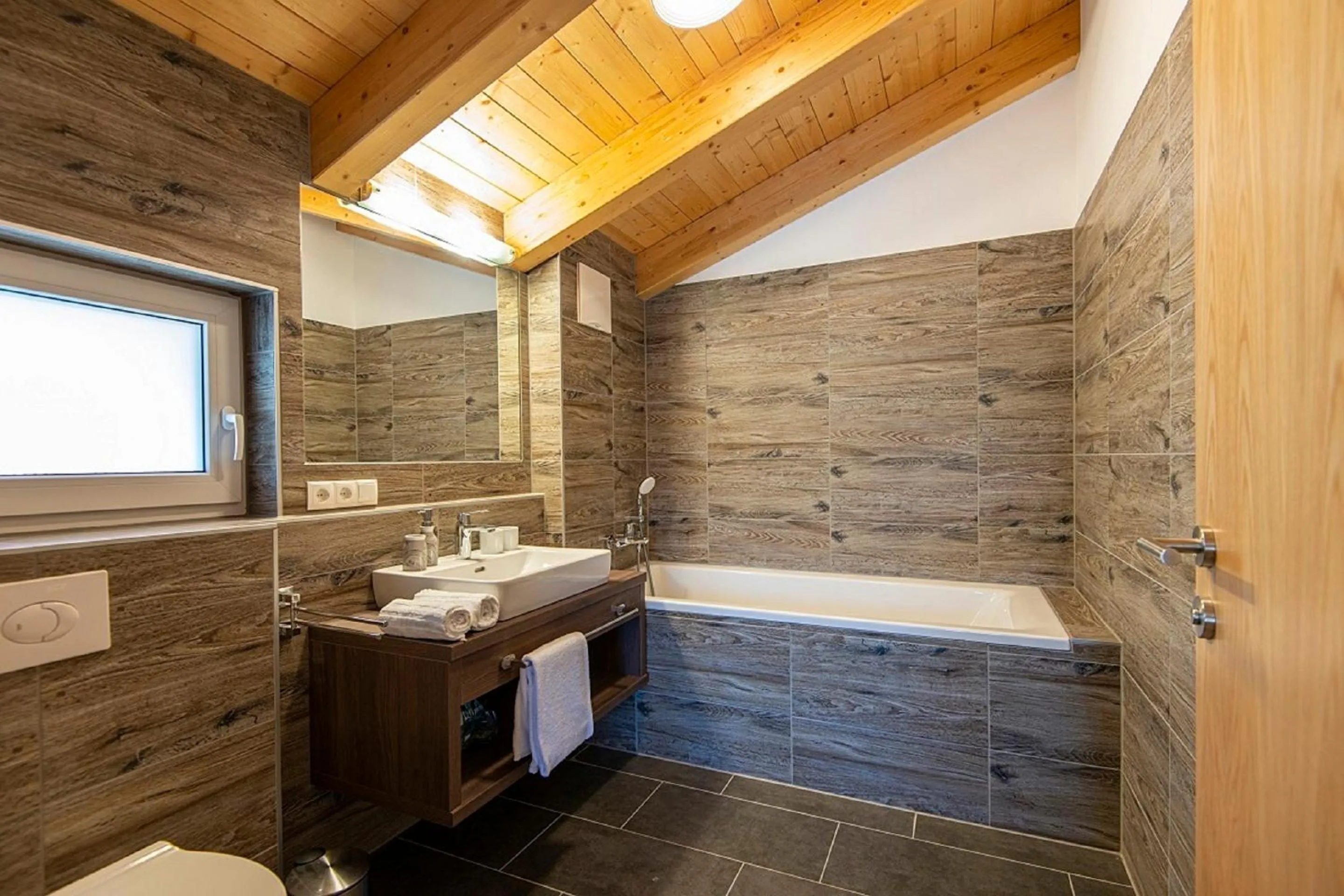 Bathroom in Apartment Dorf Wagrain Alpenleben by AlpenTravel