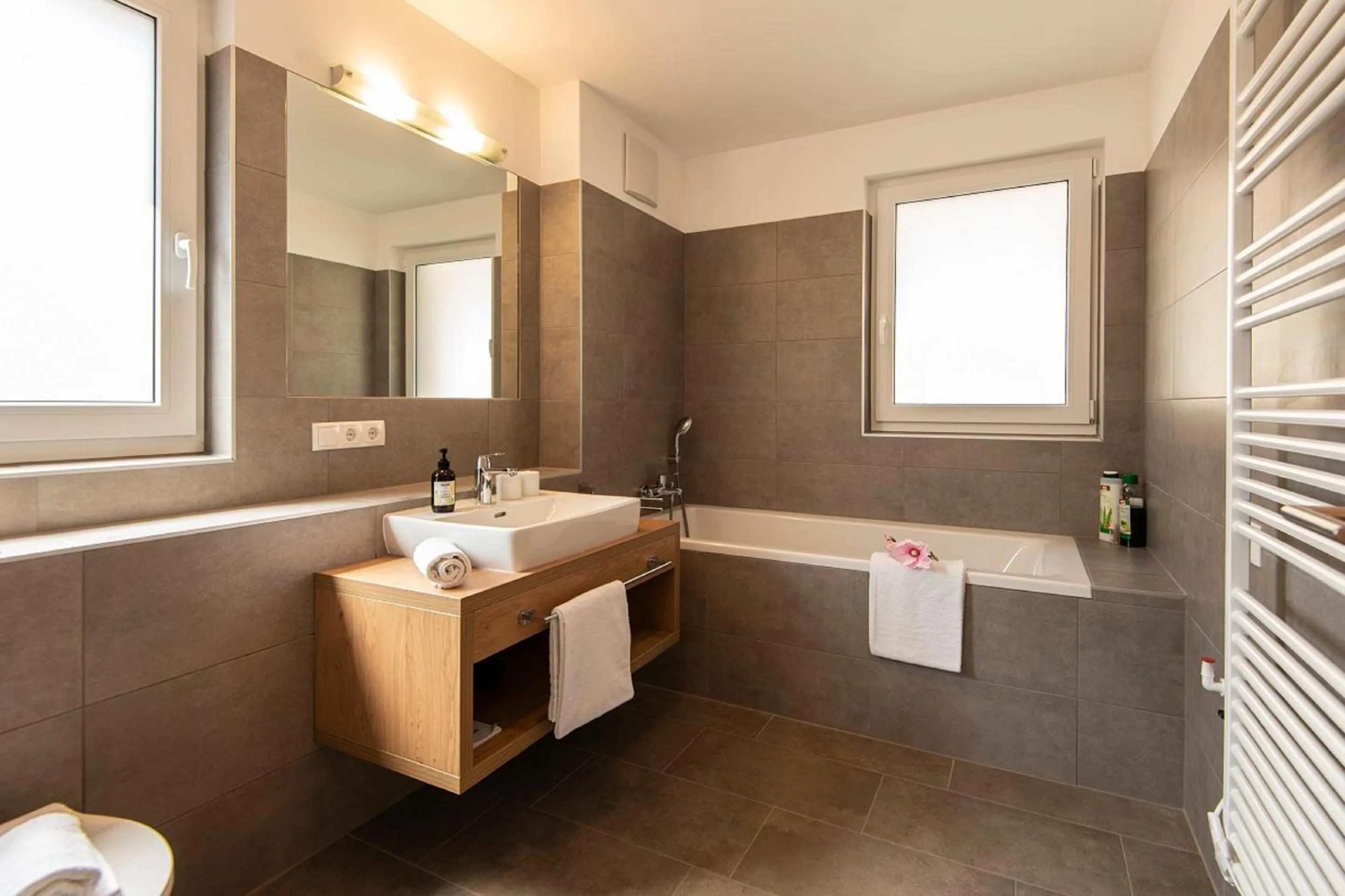 Bathroom in Apartment Dorf Wagrain Alpenleben by AlpenTravel